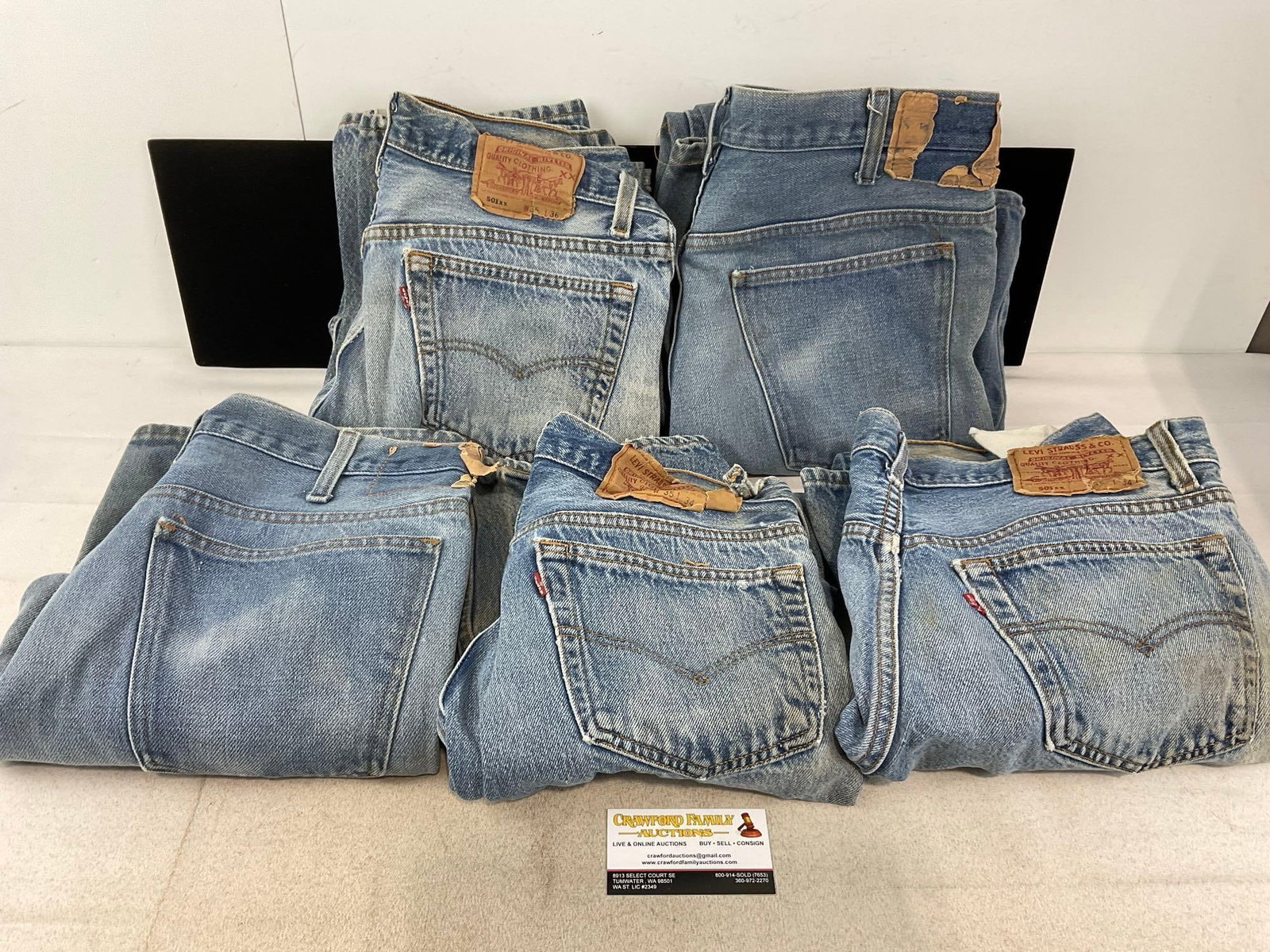 5 Vintage Levi Strauss Jeans, 501xx 35w 36l, 2x 35w 34l, & more, some wear & discoloration: Appears to be in fair shape, some wear, and discoloration . The piece measures approx 8h x 15w x 12d inches. See pics. E-6300