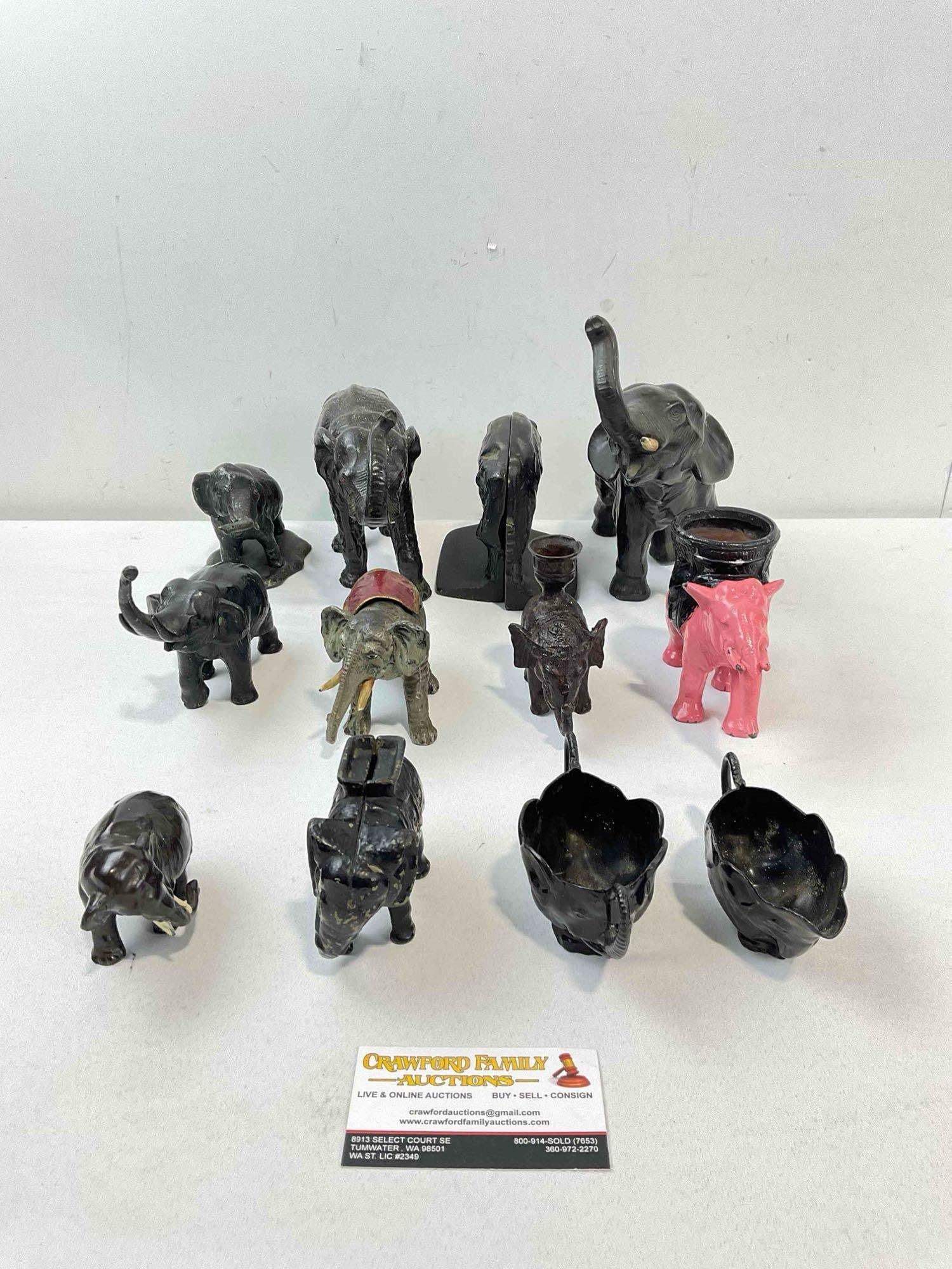 12 pcs Vintage Metal Elephant Figurines, incl. Candle Holder, Coin Bank, Book Ends & More!: 12 pcs Vintage Metal Elephant Figurines, incl. Candle Holder, Coin Bank, Book Ends & More! A few are missing tusks, have wear indicative of age and use, otherwise look to be in good condition.