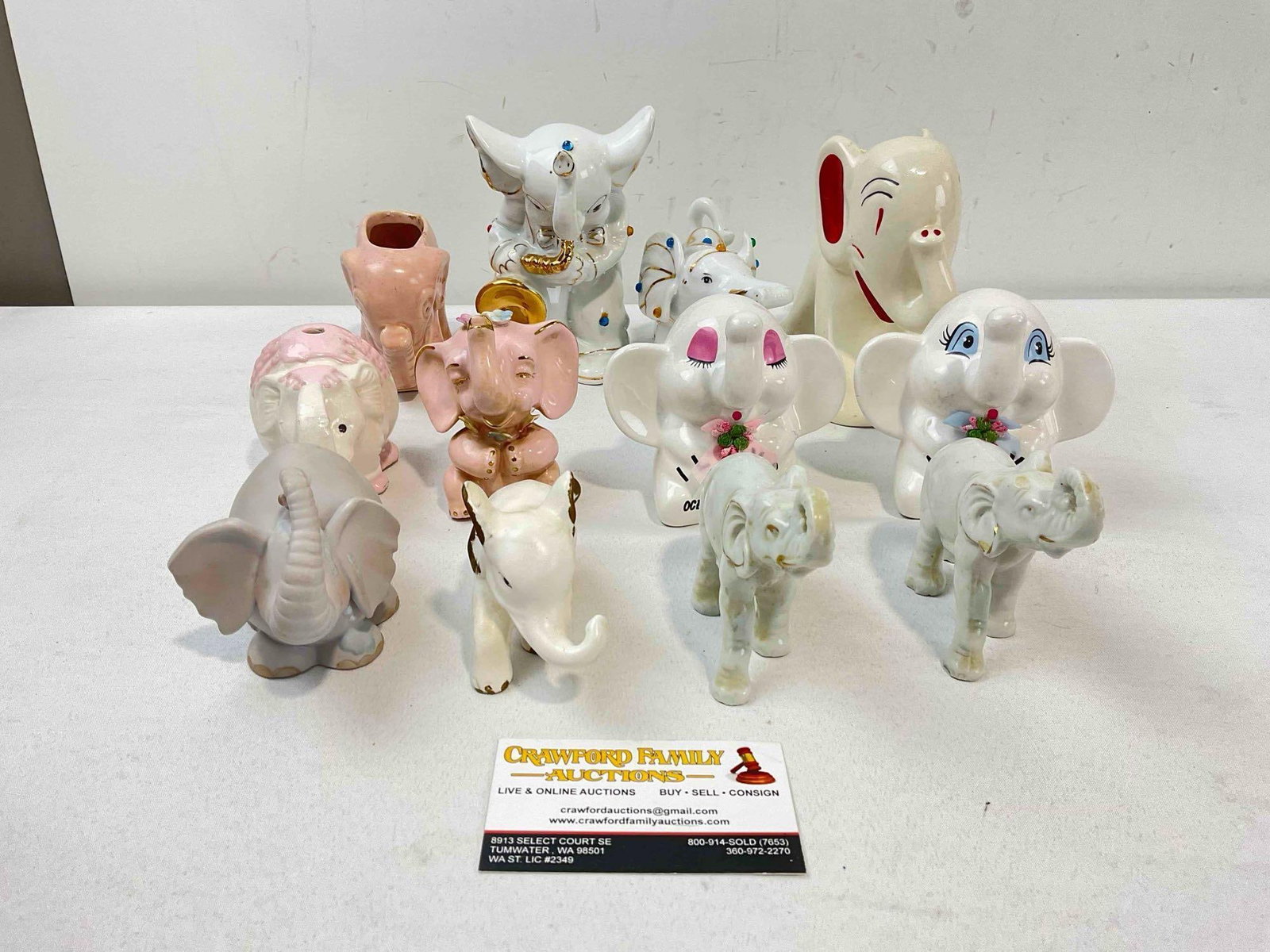 12 pcs Vintage Ceramic Elephant Figurines, incl. Planters, Coin Banks & More! Good Condition.: 12 pcs Vintage Ceramic Elephant Figurines, incl. Planters, Coin Banks & More! Good Condition. Minor wear indicative of age and use, otherwise looks to be in good condition. Fits in box measuring 1
