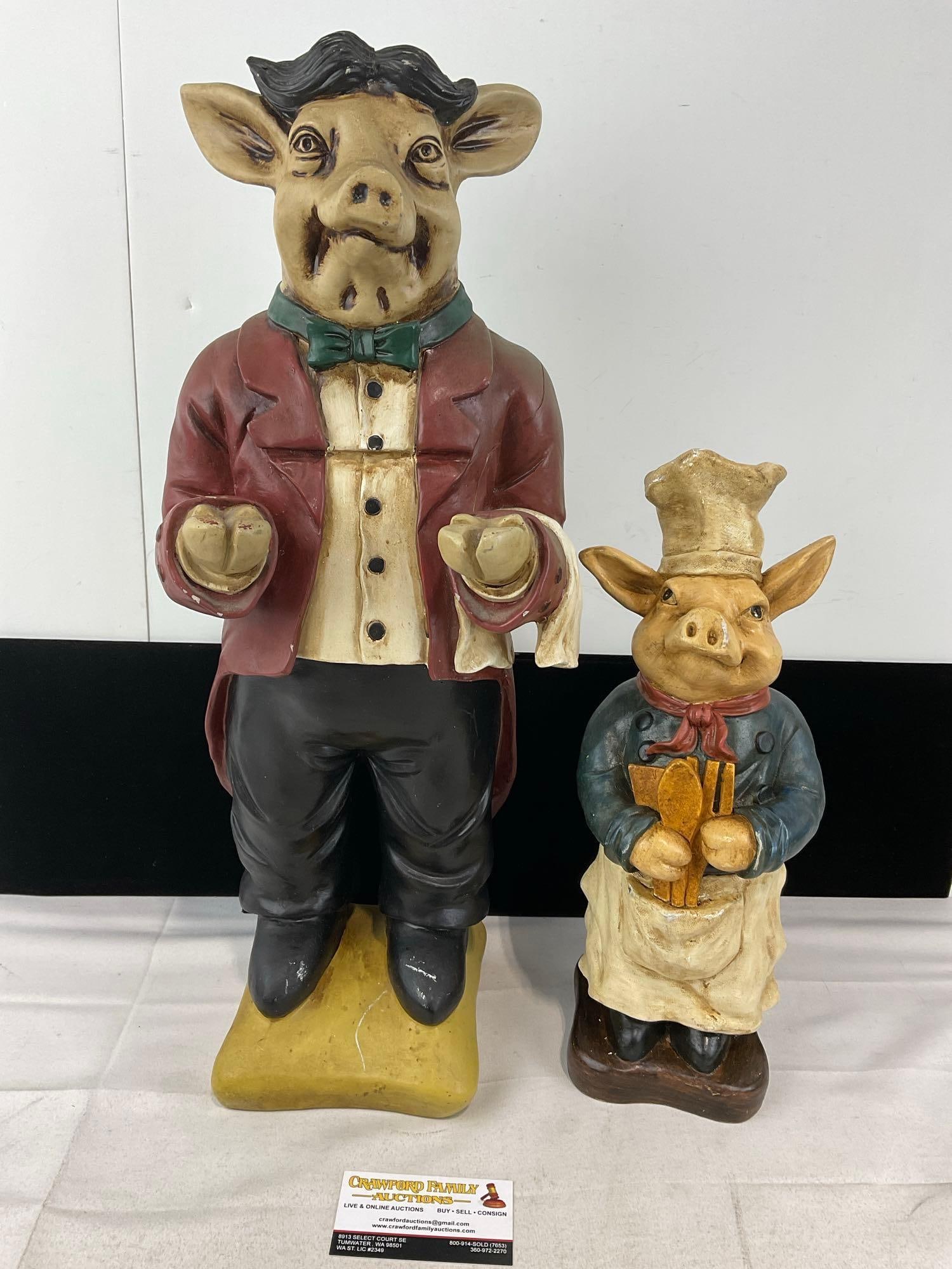 Pair of Pig Shaped Resin/Composite Figures, in Butler & Chef style Dress: Appears to be in fair shape, Larger pig piece has cracks all along one shoulder. The piece measures approx 23h x 12w x 10d inches. See pics. E-6230
