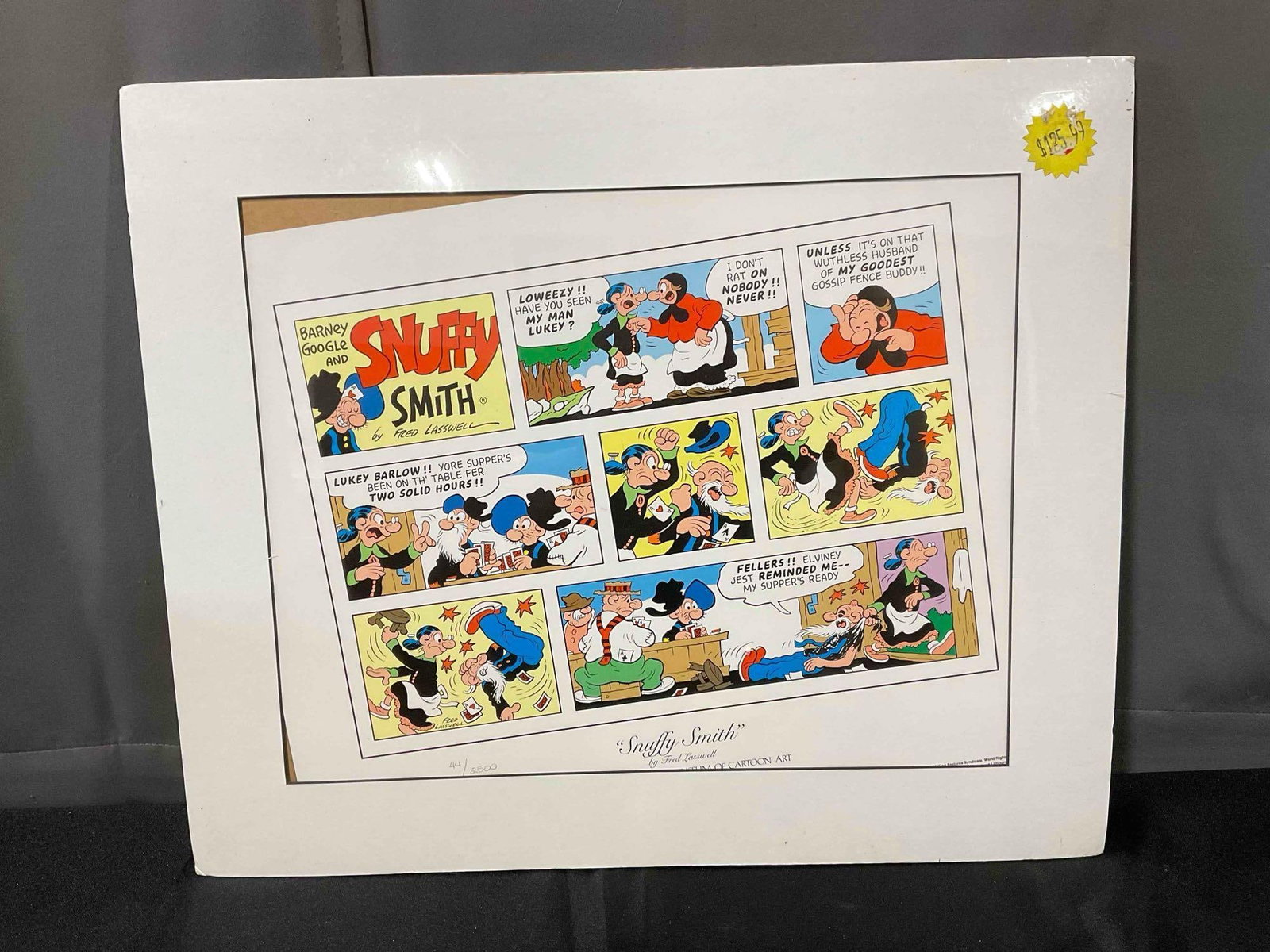Vintage Unframed Comic Strip Print "Snuffy Smith" by Fred Lasswell Ltd. Ed. 44/2500, w/ COA.: Vintage Unframed Comic Strip Print "Snuffy Smith" by Fred Lasswell Ltd. Ed. 44/2500, w/ COA. Has wear to plastic wrapping, improperly centered, otherwise in fair condition. Pair to lot #69. Measures