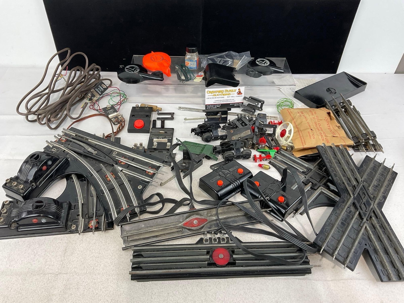 Asst of Lionel O Scale Track Pieces, Crossroads & more, Switches, Clips & more: Appears to be in good shape. The piece measures approx 6h x 13w x 11d inches. See pics. E-5430