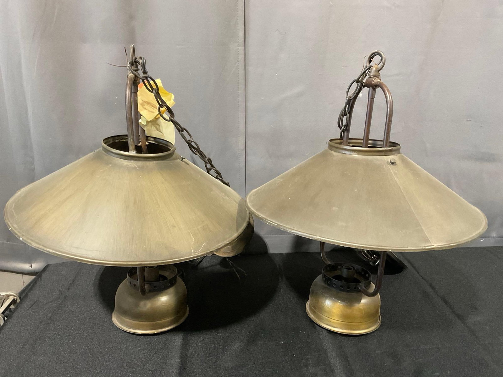 Pair of Electrified Swag Hanging Lamps, Bronze tone metal, w/large shades: Appears to be in fair to good shape, hardwired, untested. The piece measures approx 11h x 23w x 17d inches. See pics. E-6240