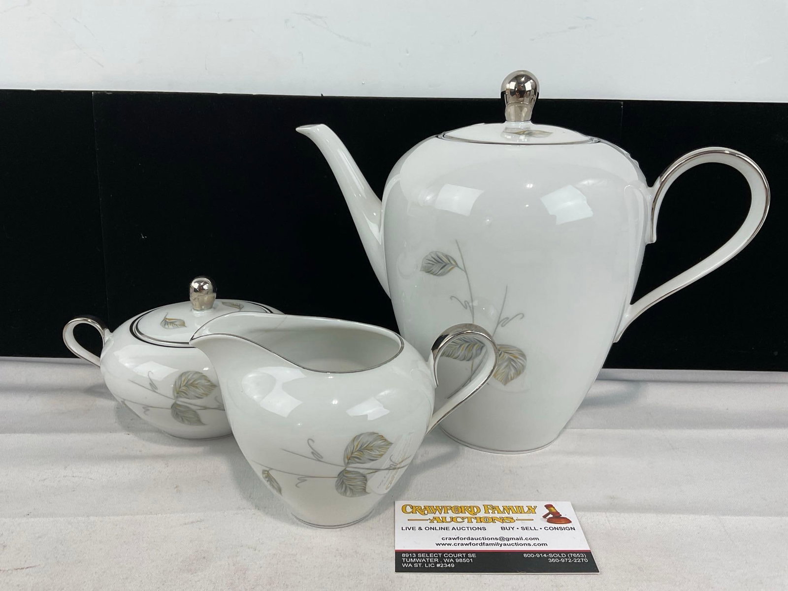 Edelstein Bavarian China, Normandy Pattern, Teapot, creamer & sugar bowl w/lid: Appears to be in good shape. The piece measures approx 9h x 12w x 10d inches. See pics. E-6270
