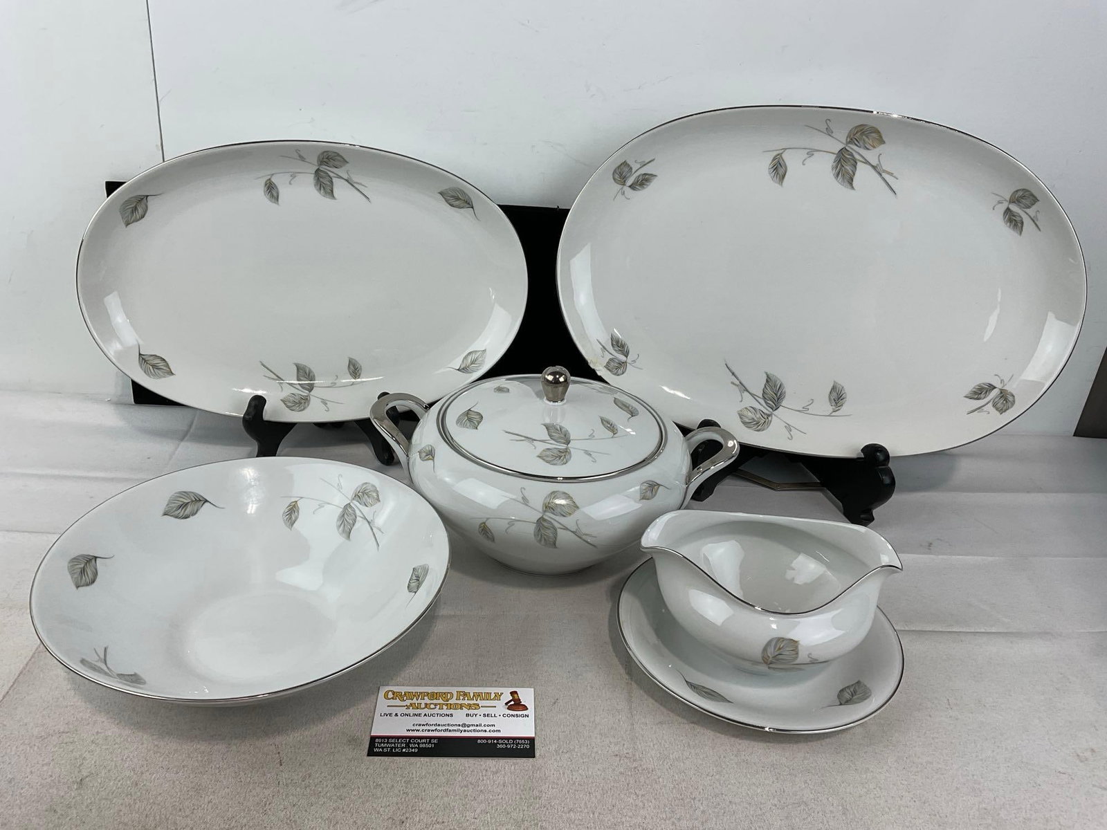 Edelstein Bavarian China, Normandy Pattern, 2 Platters, 1 serving bowl, gravy bowl & lidded bowl: Appears to be in fair to good shape, one chip approx 1 x .5 x .5 inch on the larger platter. The piece measures approx 9h x 16w x 11d inches. See pics. E-6270