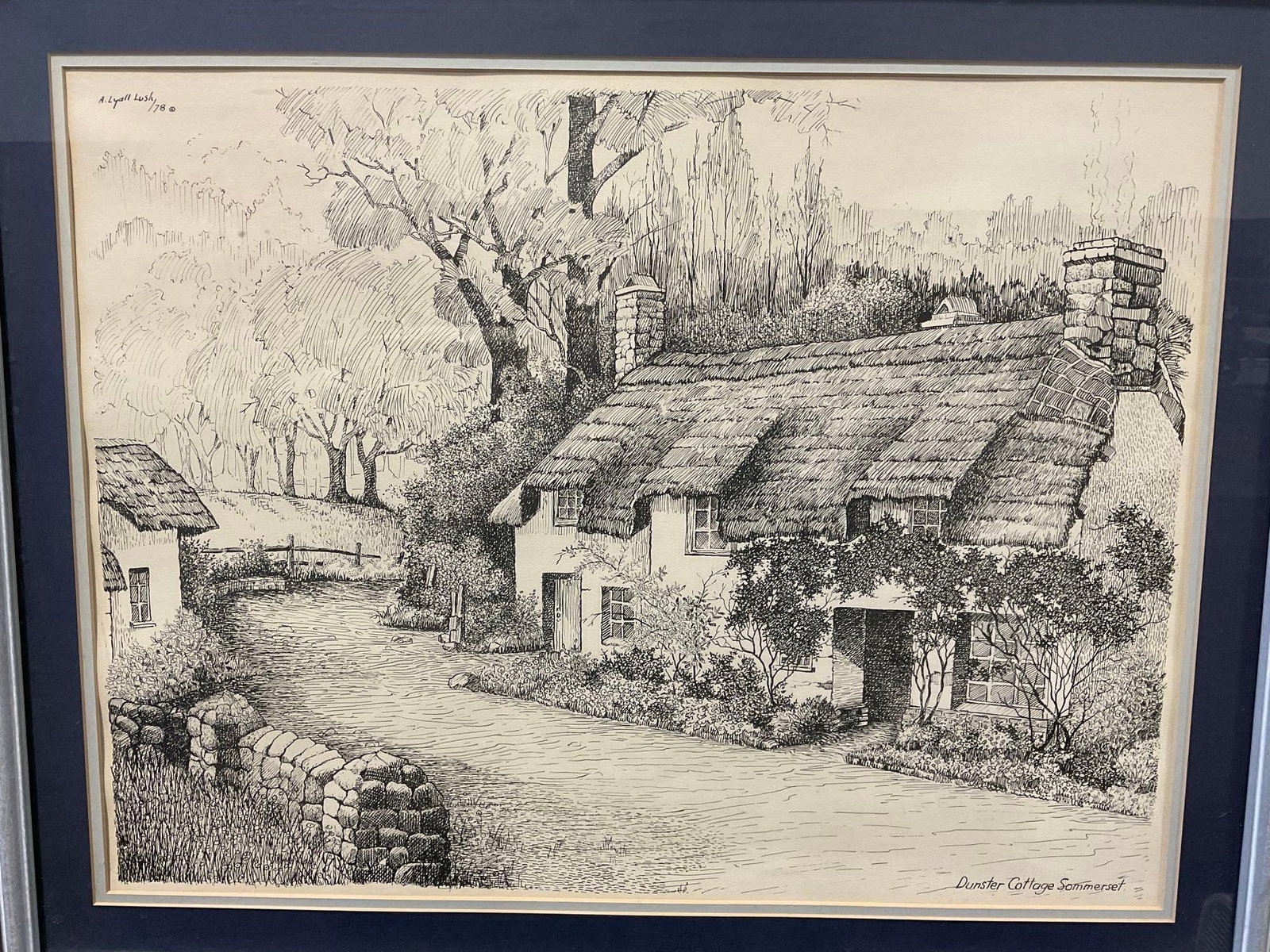 Framed Signed Pen Drawing Lithograph titled Dunster Cottage Sommerset, by A. Lyall Lush, 25x31 inch: Appears to be in good shape. The piece measures approx 25h x 31w x 3d inches. See pics. E-6410