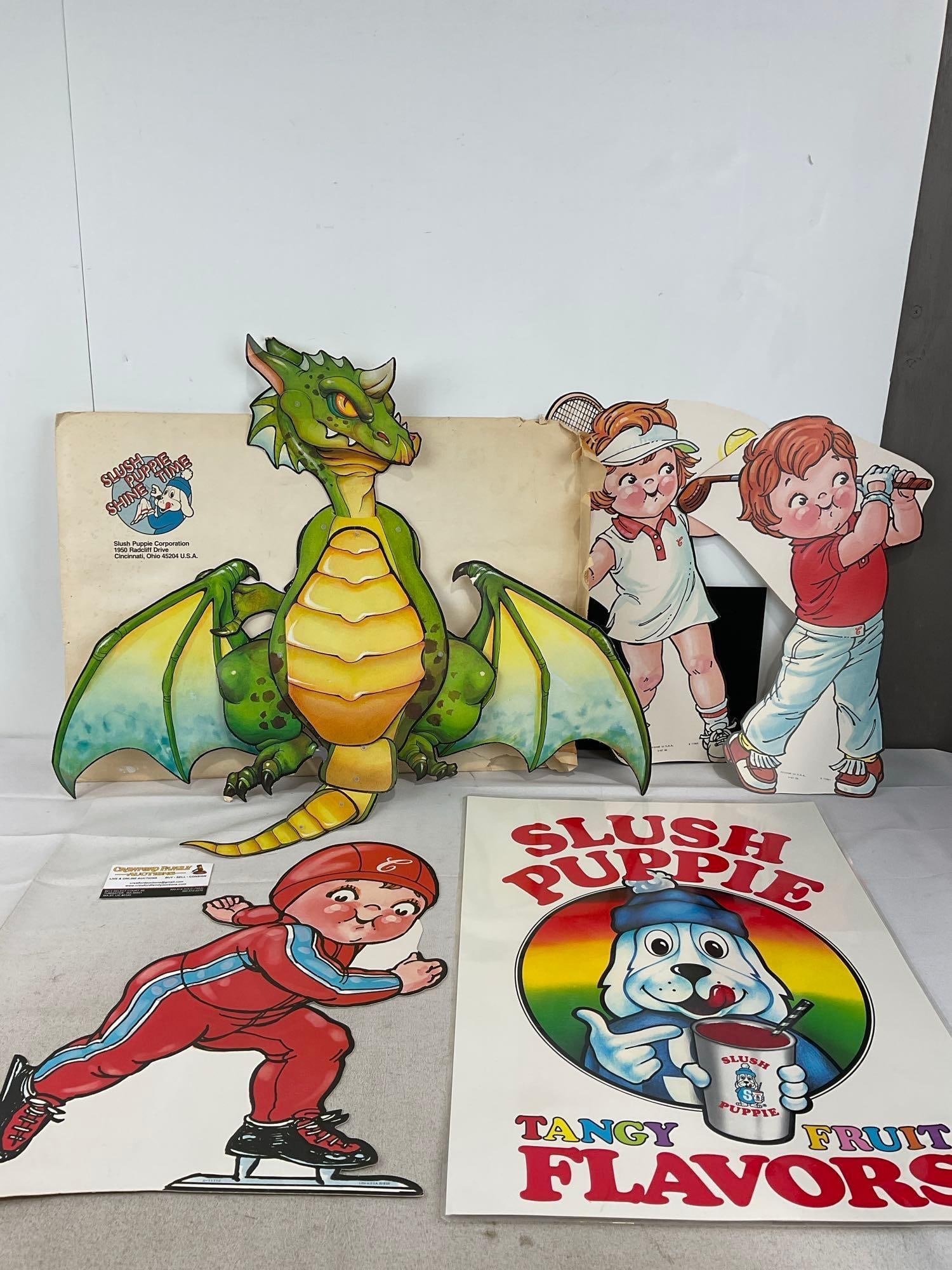 Vintage Promotional signs, 4x for Campbell Soups, Green Posable Dragon, & Slush Puppie sign: Appears to be in good shape. The pieces fit in a box that measures approx 16h x 22w x 3d inches. See pics. E-6230