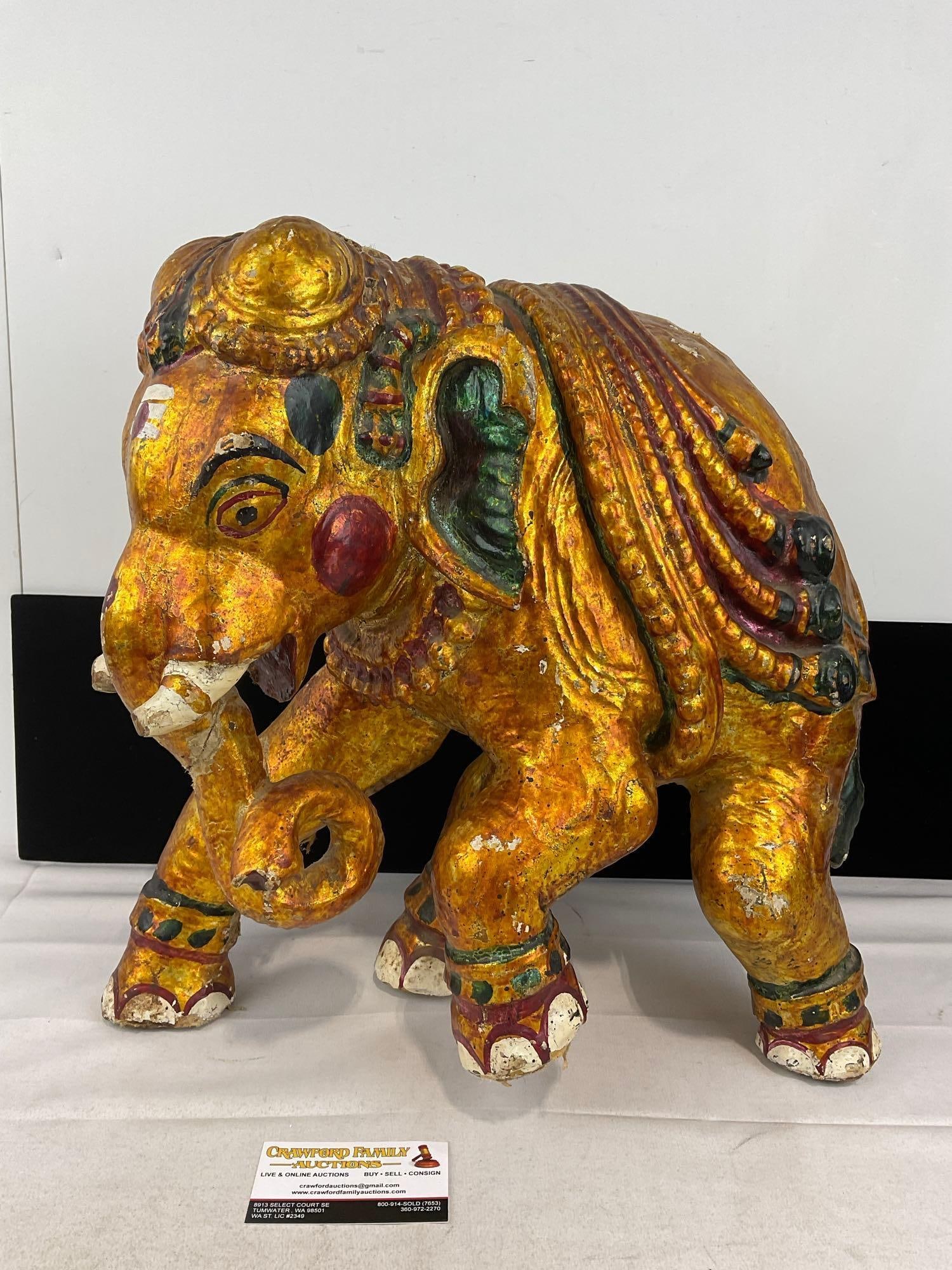 Large Plaster Indian Elephant Sculpture, gilt finish & handpainted, shows wear, 18x18x11 inches: Shows fabric under the finish, looks to be plaster or similar material beneath that. Appears to be in fair shape, shows cracks, some look to be previously repaired. The pieces fit in a box that