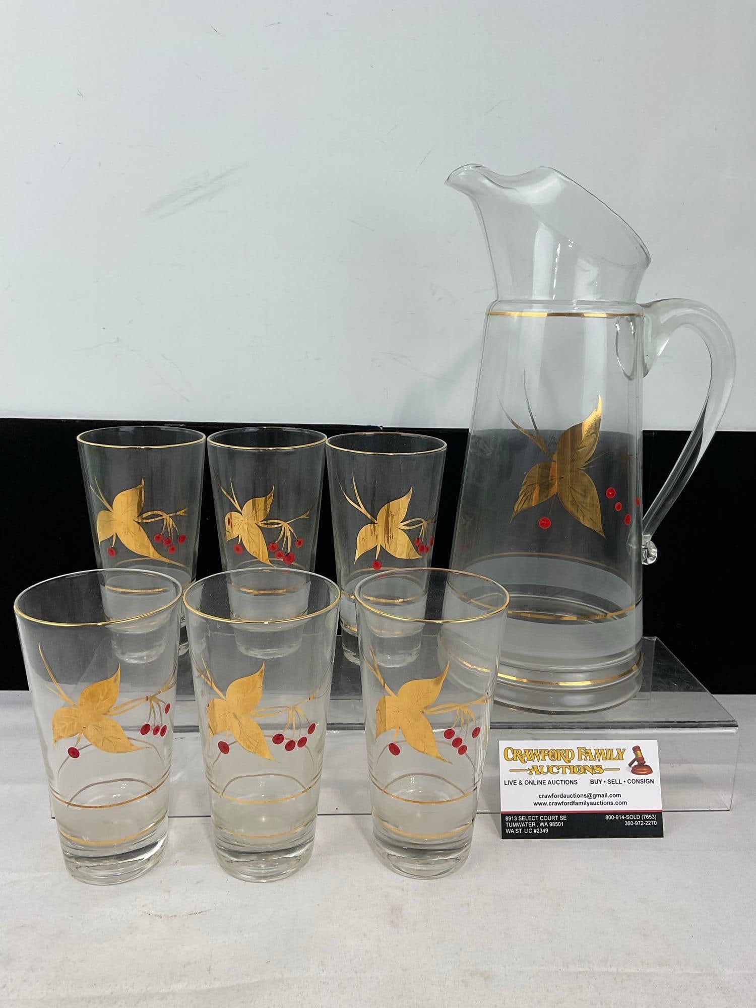 Vintage 1950s-60s Gilt Design Pitcher & 6 Glasses, Leaf & Red Berry motif: Appears to be in good shape. The piece measures approx 9h x 13w x 13d inches. See pics. E-5980