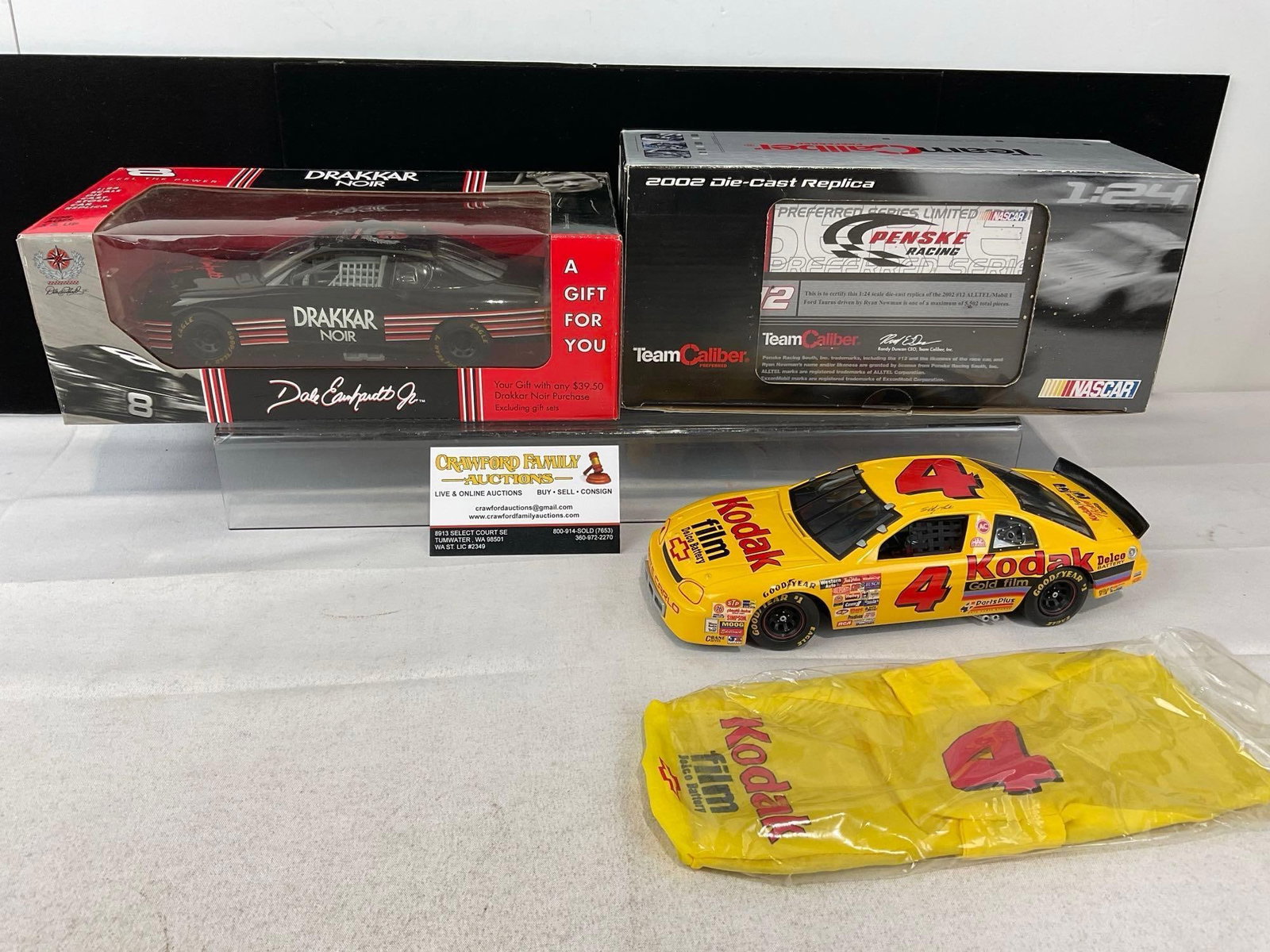 3x Diecast Race Cars 1:24 Scale, Dale Earnhardt Jr, Ryan Newman #12, Kodak #4 w/boxes: Appears to be in good shape. The piece measures approx 12h x 11w x 6d inches. See pics. E-6150
