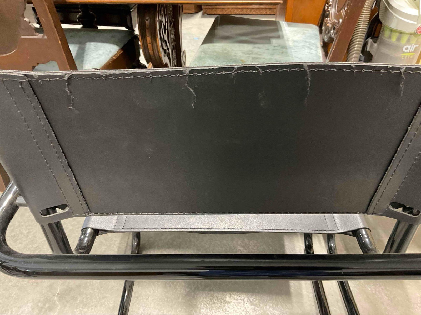 Pair of Black Metal & Faux Leather Cantilever Chairs. Fair Condition. Measures 24" x 21" x 32" - 8