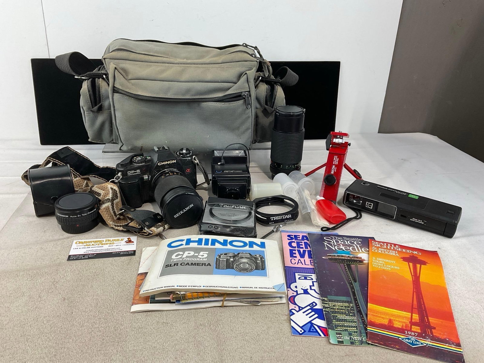 Chinon CP-5 SLR Camera & Kodak Extralite Thin Profile Camera, Case, Lenses, & accessories: Appears to be in good shape. The piece measures approx 9h x 17w x 9d inches. See pics. E-6300