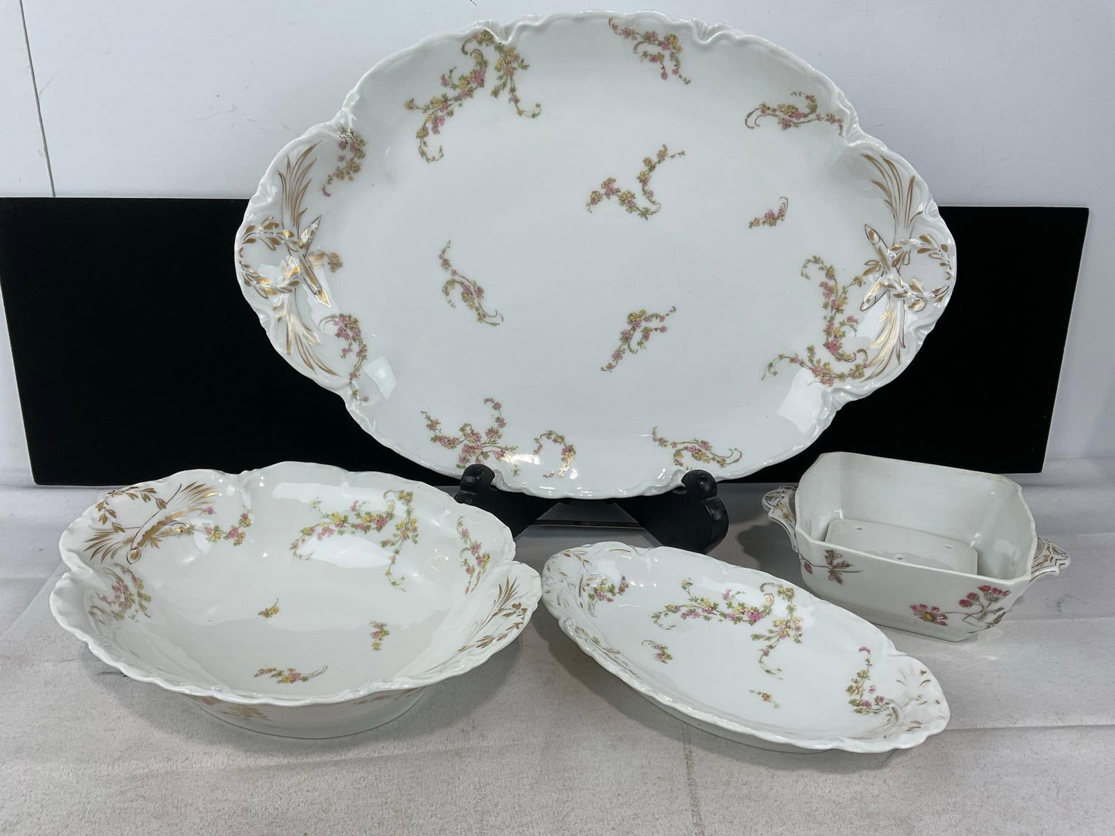 Haviland Limoges Norma Pattern Oval Platter, Relish Tray & Open Vegetable Bowl, Handled Butter Dish: Appears to be in good shape. The piece measures approx 4h x 17w x 11d inches. See pics. E-6560