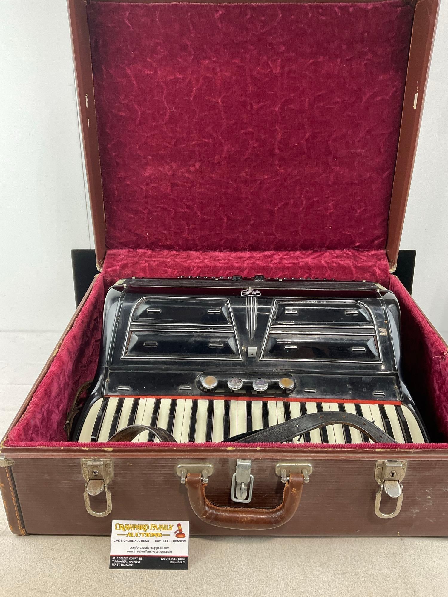Vintage 1950s Italian Noble Piano Accordion, Black/White finish, w/case, 20x24x10 inches: Appears to be in good shape. The piece measures approx 20h x 24w x 10d inches. See pics. E-6560 *Oversized shipping may apply*