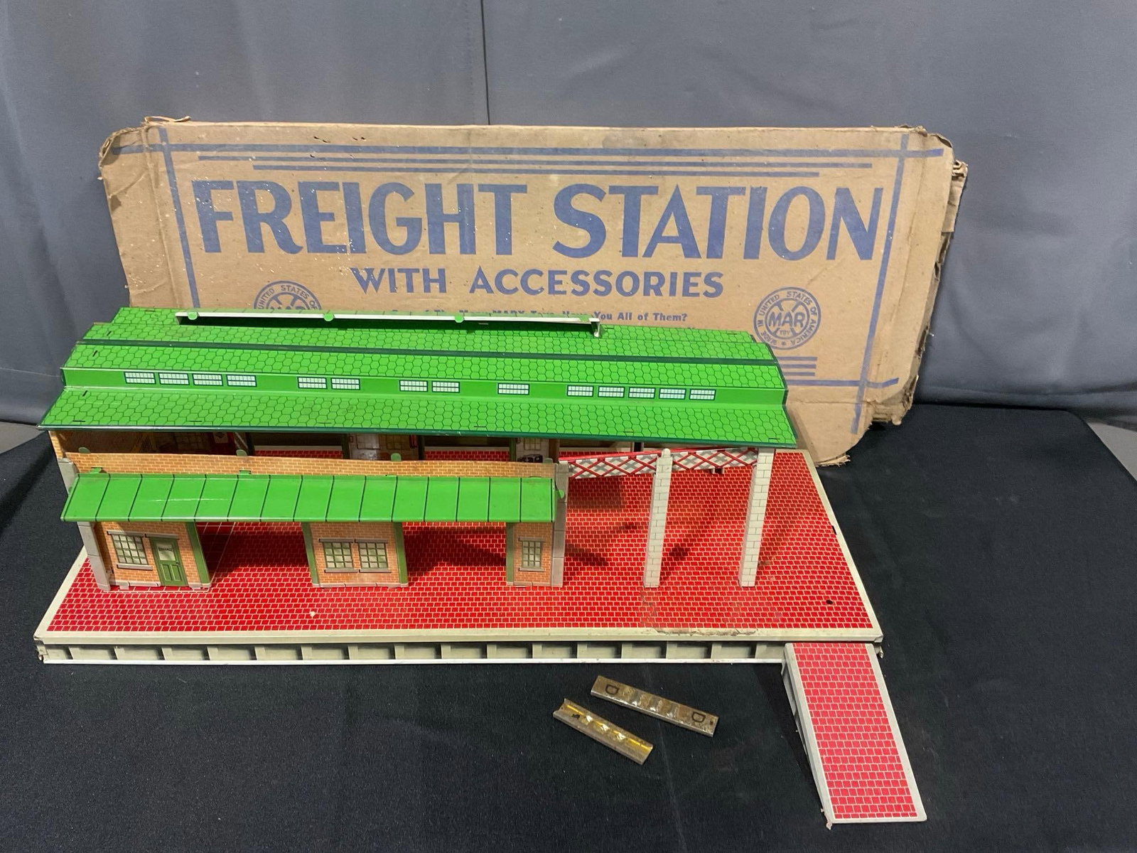 Marx Freight Station Tin Train Model w/original cardboard box, 5h x 31w x 13d inches: Appears to be in fair to good shape, unclear if there are missing pieces, some wear on the metal. The piece measures approx 5h x 31w x 13d inches. See pics. E-6610