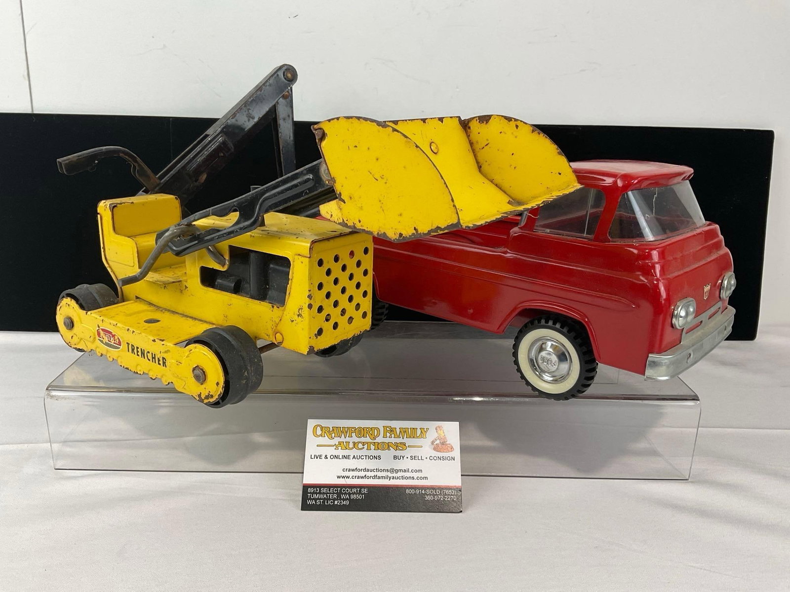 Pair of 1960s Pressed Steel Toys, Tonka Trencher No.534 Loader & Red Nylint Econoline Pickup Truck: Appears to be in good shape. The piece measures approx 11h x 13w x 10d inches. See pics. E-6610