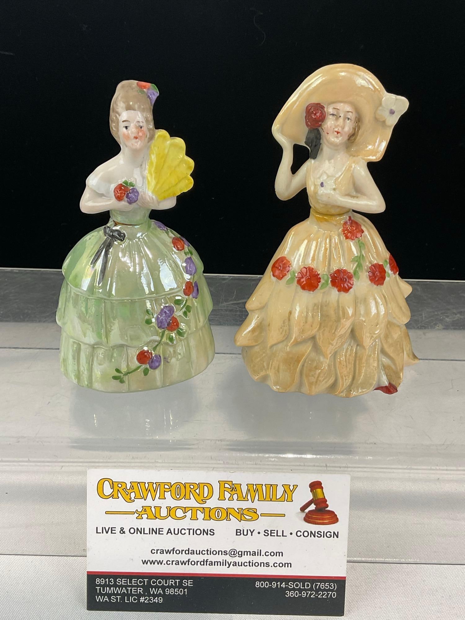 Pair of Fine Perfumeries, Two Glazed Lady Figures, w/thin glass dobbers, some wear: Appears to be in fair to good shape, one cork is broken off, one small ship on the inside of the rim of the other. The piece measures approx 6h x 6w x 3d inches. See pics. E-6610