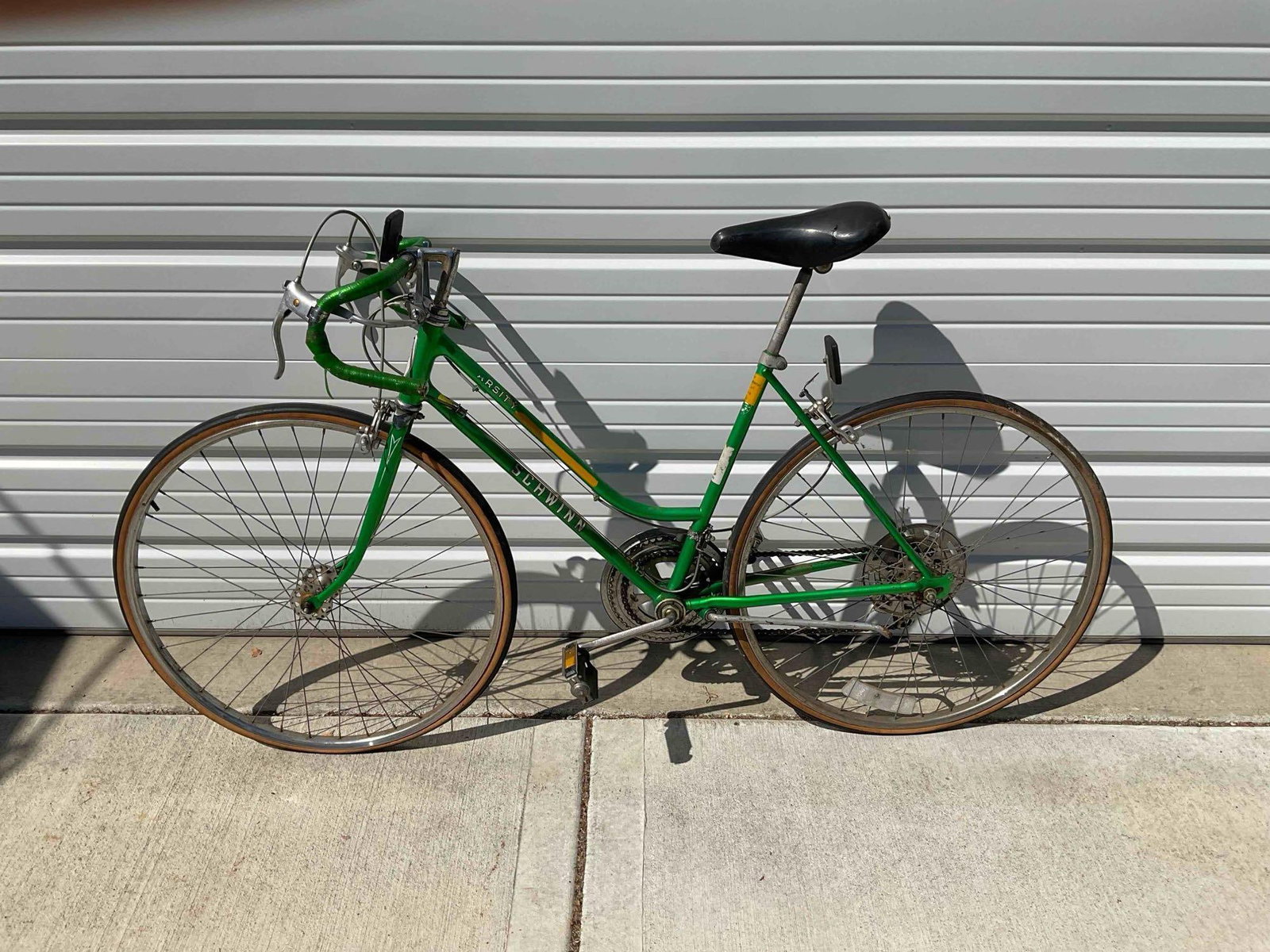Vintage Green Schwinn Varsity 10 Speed Bicycle w/ 25" Wheels. Fair Condition. See pics.: Vintage Green Schwinn Varsity Single Speed Bicycle w/ 25" Wheels. Fair Condition. Serial number is FM514954. Wheels are flat, piece has wear indicative of age and use, otherwise looks to be in fair co