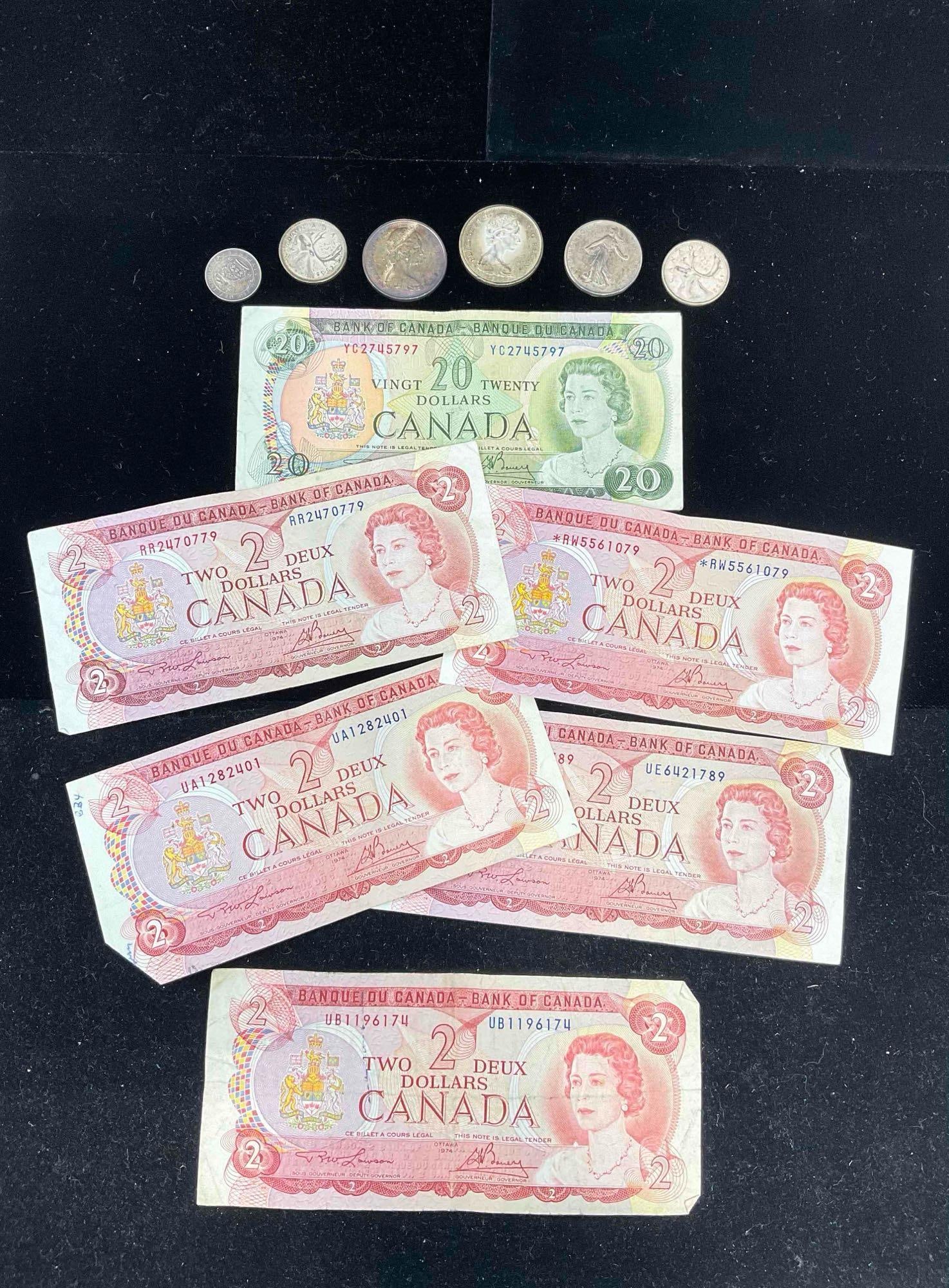 Canadian Currency & Silver coins 5x 1974 $2 Bills, 1969 $20 bill + 2x Silver halfs , 2 quarters P...: C-6610 Silver half's 1966, 1965 Silver Quaters 1965,1962 Antique 1918 French silver 2 francs ( almost the size of a half dollar) Antique 1918 British Silver 6 pence 