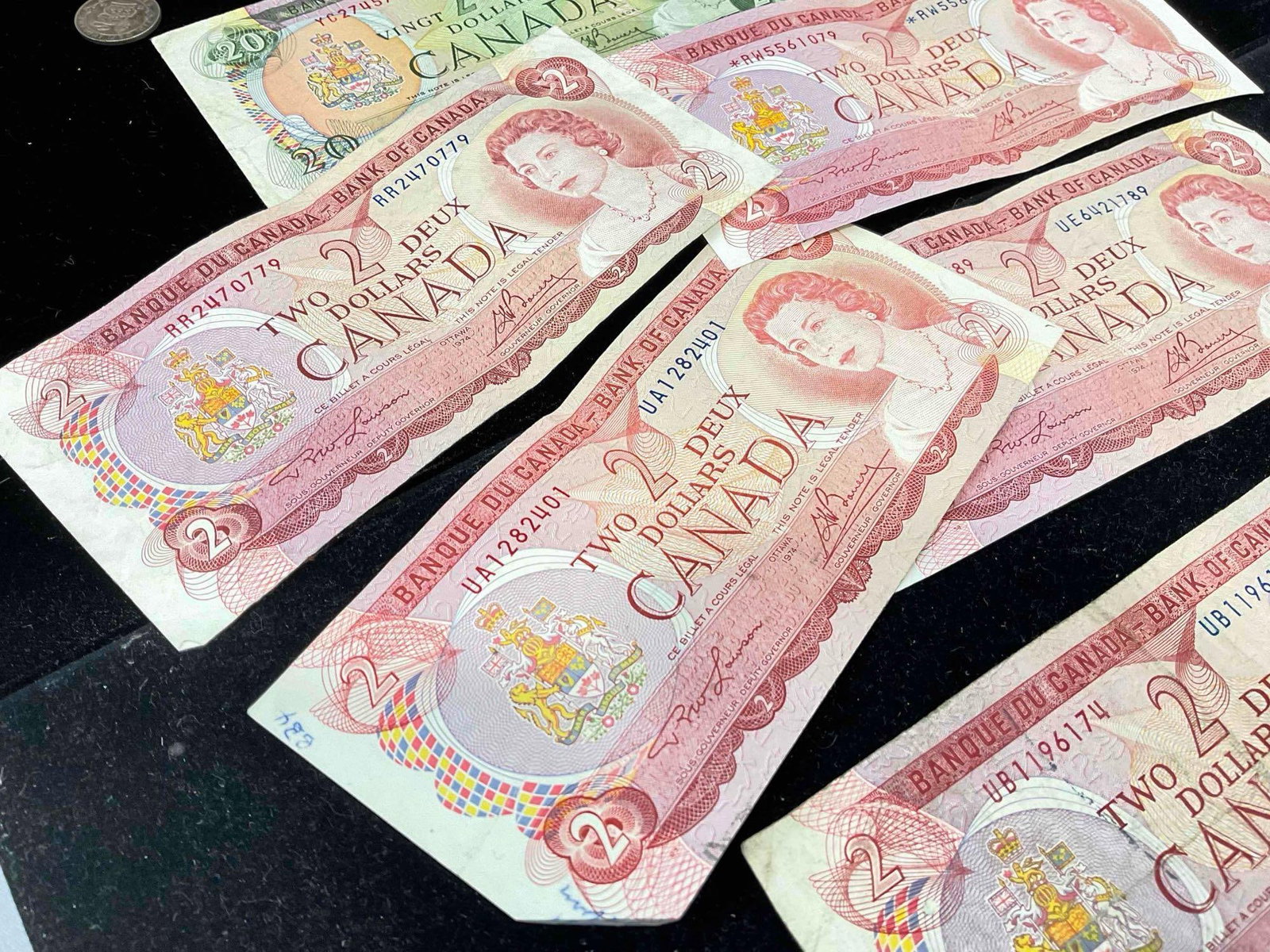 Canadian Currency & Silver coins 5x 1974 $2 Bills, 1969 $20 bill + 2x Silver halfs , 2 quarters P... - 2
