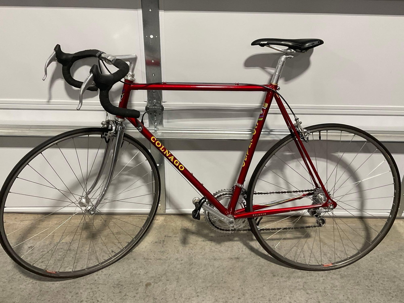 Vintage 80s Classic Colnago Road Bicycle, Red/Chrome, w/Cinelli Handlebars, Wolber tires: Appears to be in good shape. The piece measures approx 41h x 66w x 17d inches. See pics. E-6600 *Freight Required if shipped, Buyer Arranged/Responsibility*