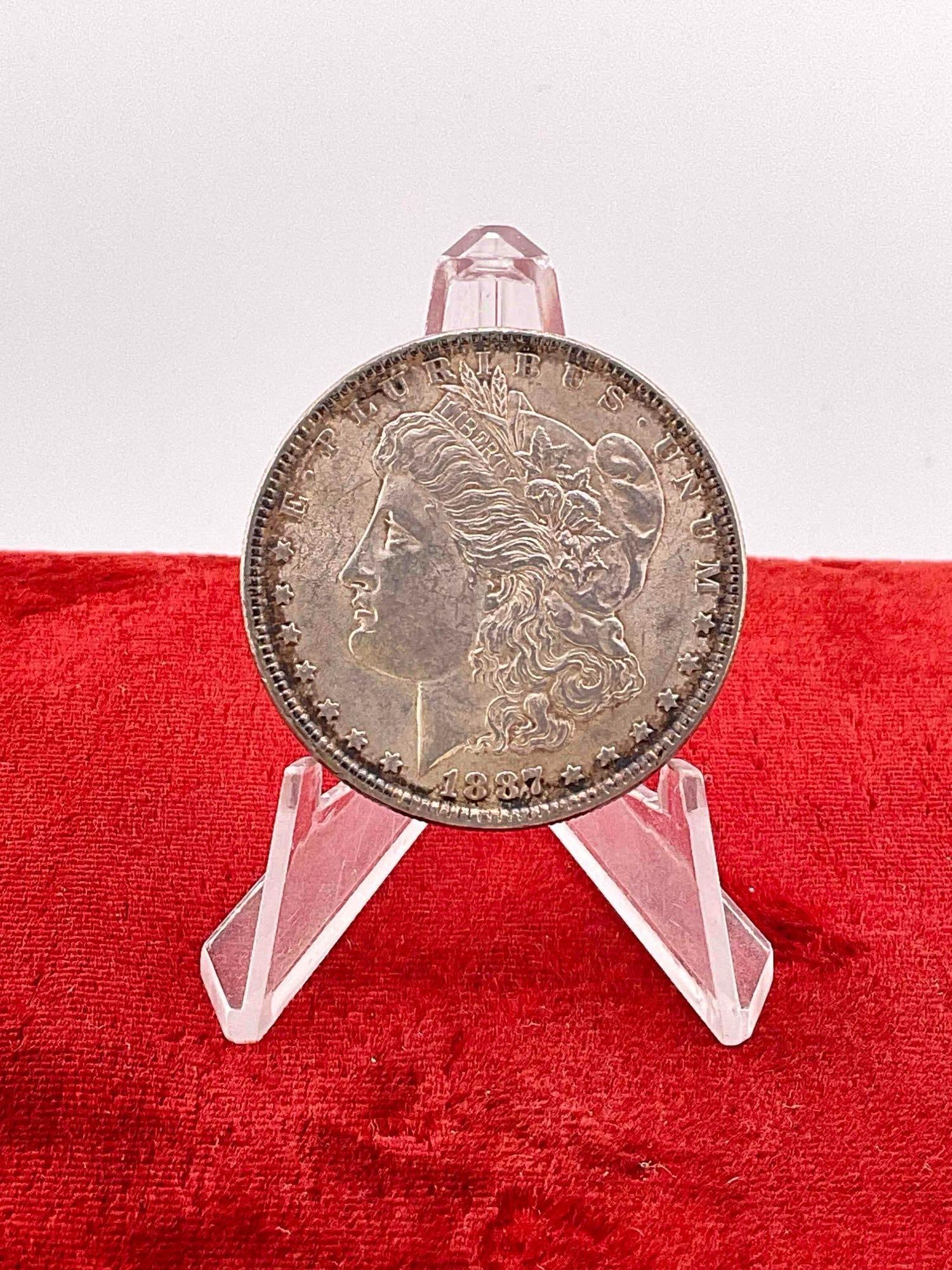 Antique 1887 Silver morgan Dollar, Nice coin in gradable condition w/ obverse rim toning: c-6600