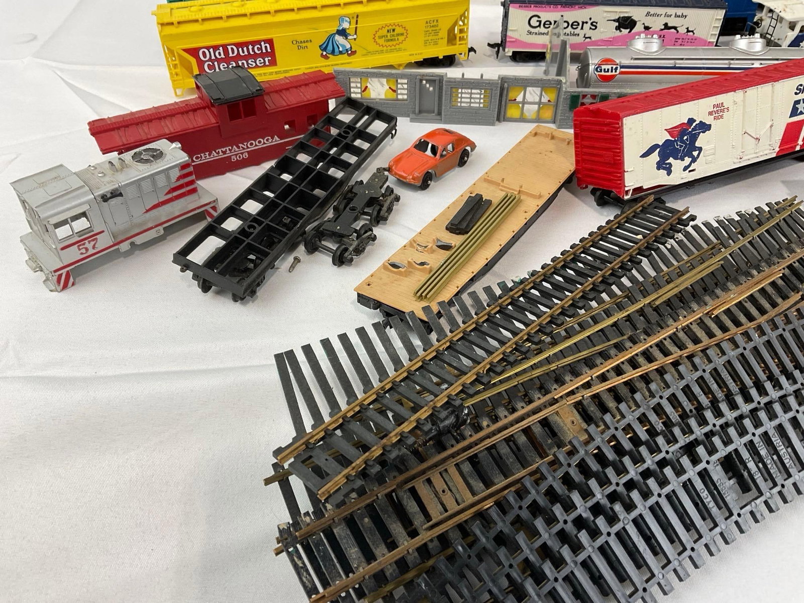 Collection of HO Scale Train Cars, Box Cars, Cabooses, small amount of Track, Switchyard Set & more - 2