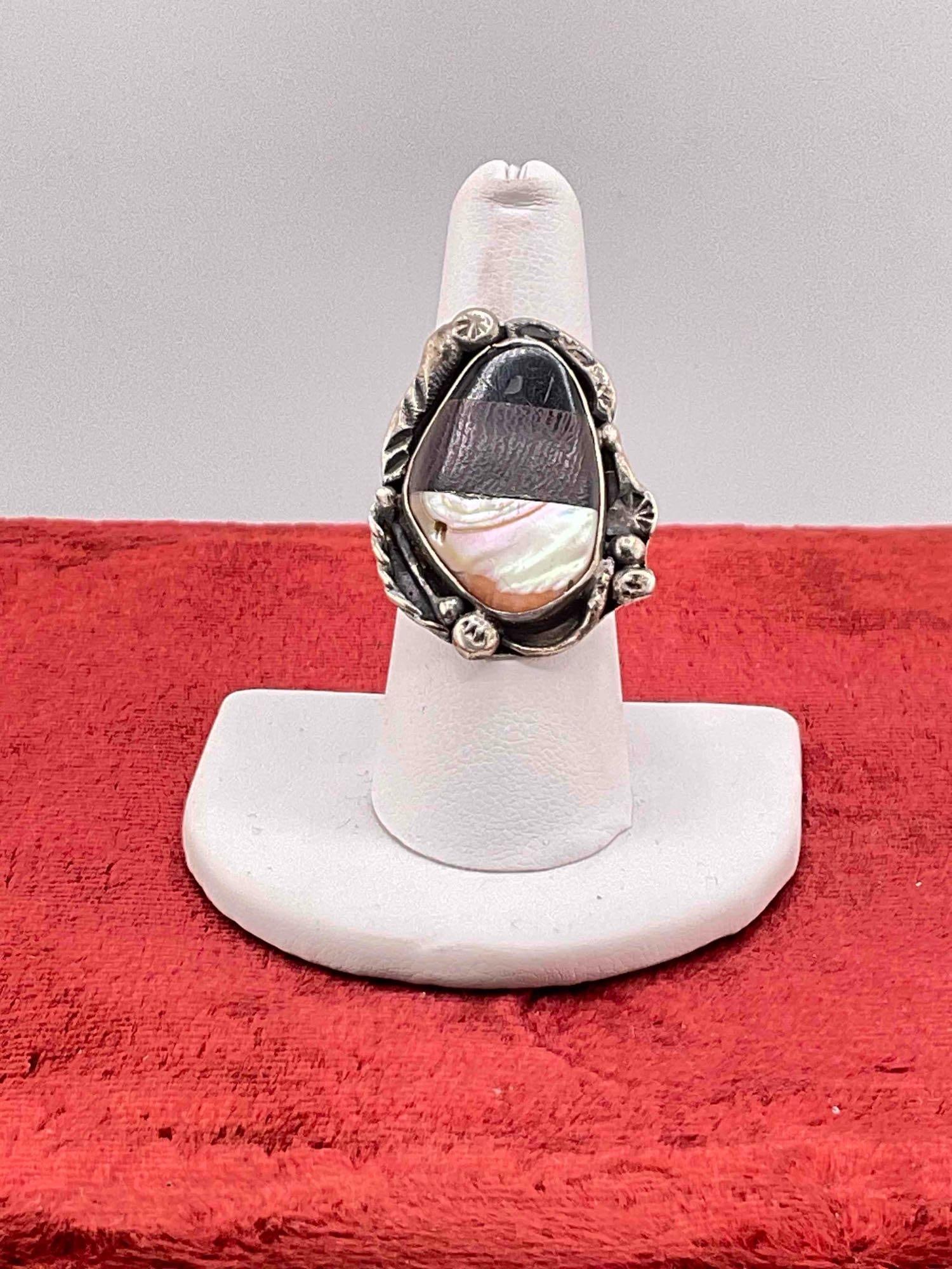 Vintage Native American Signed C.B. Sterling Silver Ring w/ Multi-Stone Setting, incl. Shell, Size: Vintage Native American Signed C.B. Sterling Silver Ring w/ Multi-Stone Setting, incl. Shell, Size 7.5 Piece is not stamped Sterling but tested positive for Sterling silver. Setting looks to be jet,