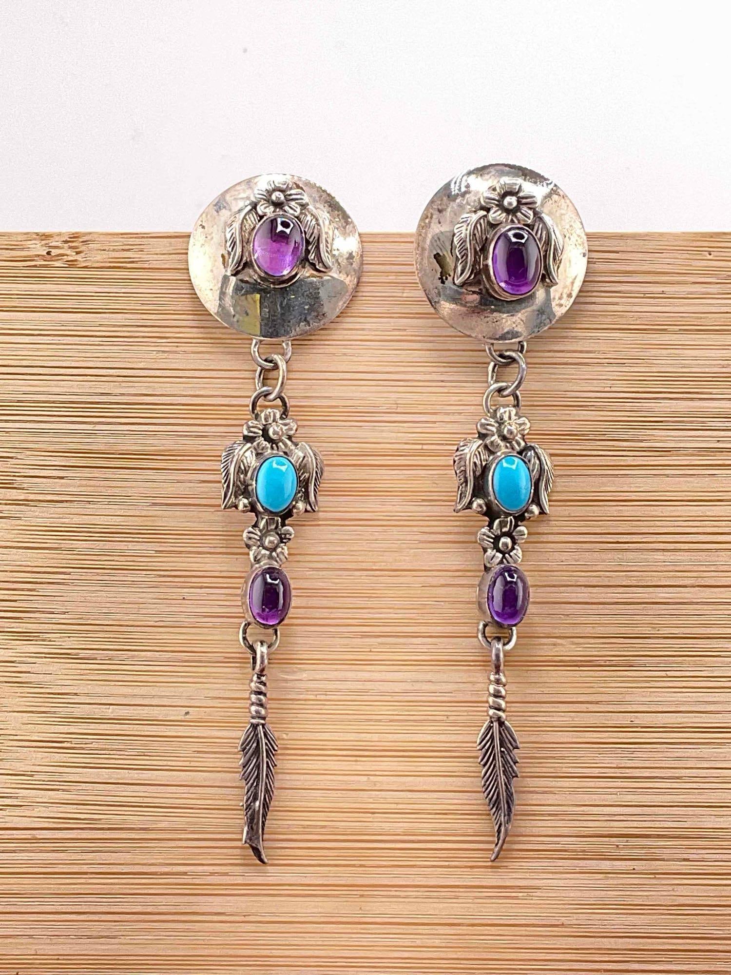 Vintage Carol Felley Sterling Silver Earrings w/ Amethyst & Turquoise Toned Settings. See pics.: Vintage Carol Felley Sterling Silver Earrings w/ Amethyst & Turquoise Toned Settings. Weighs 16 grams. Stamped 91 on reverse. DM-414