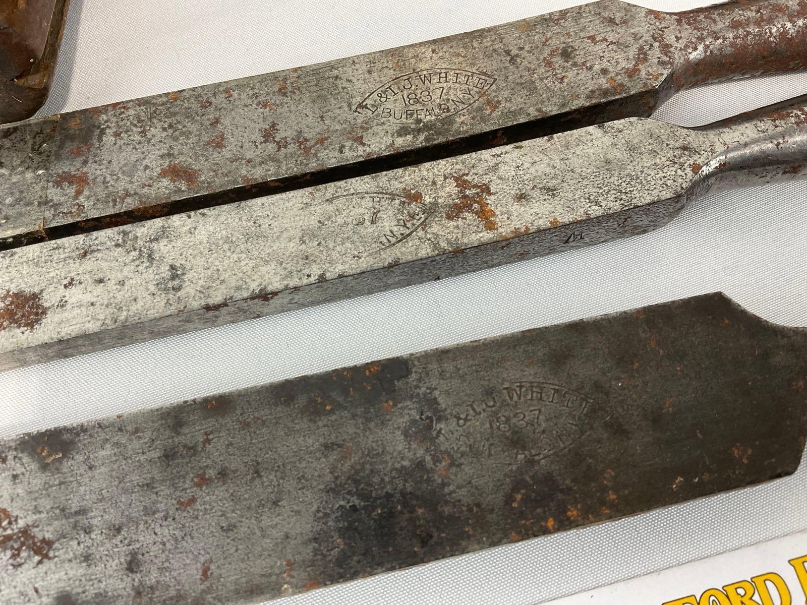3 L. & I.J.White 1837 Iron Chisels, 4 Folding Draw Knives, 2x A.J. Wilkinson & Co., Dunlap & P.S &W - 2