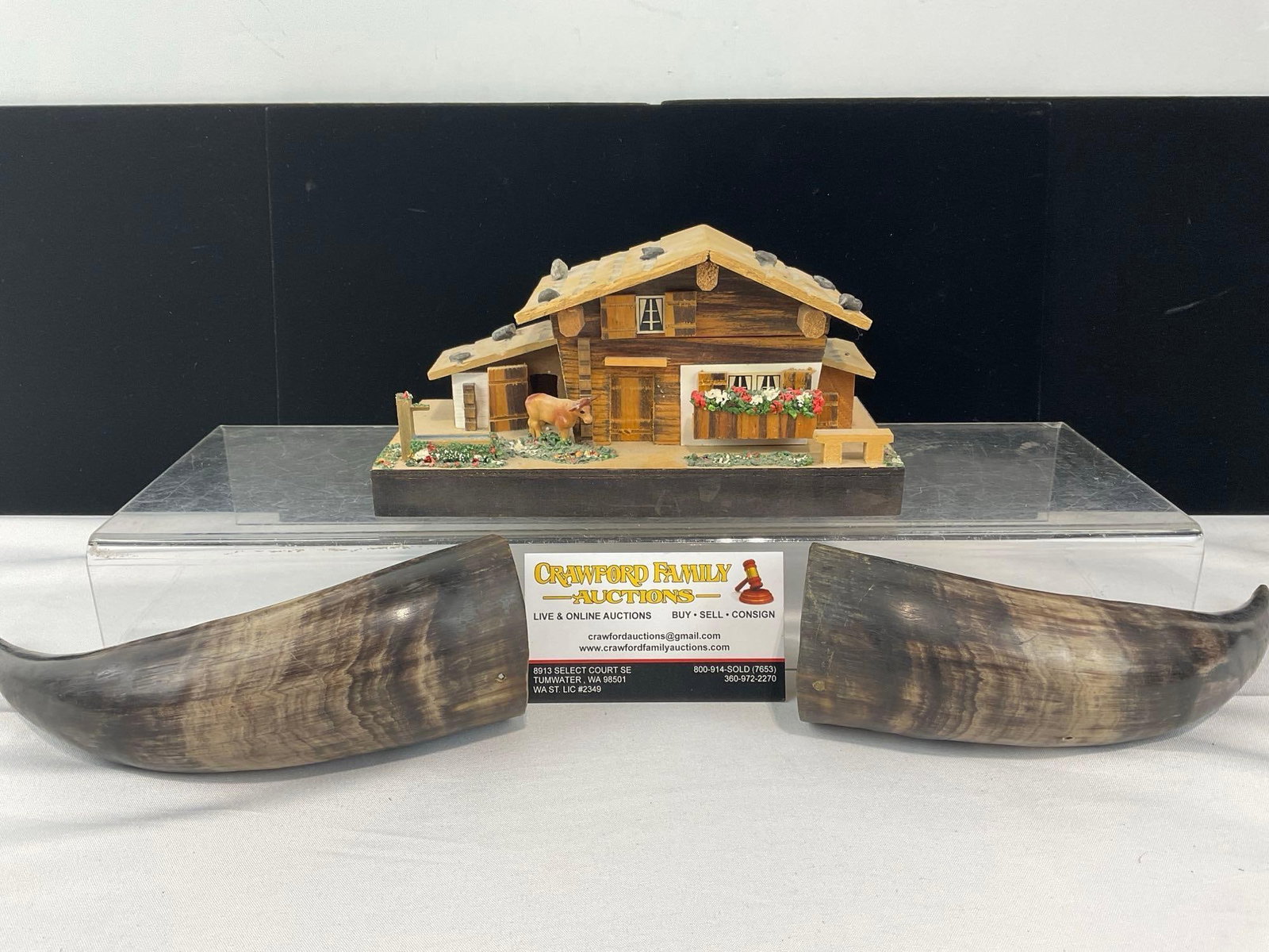 Pair of Cow Horns, & Mid Century Swiss Alpine Chalet Music Box: Appears to be in good shape. The piece measures approx 7h x 10w x 5d inches. See pics. E-6610