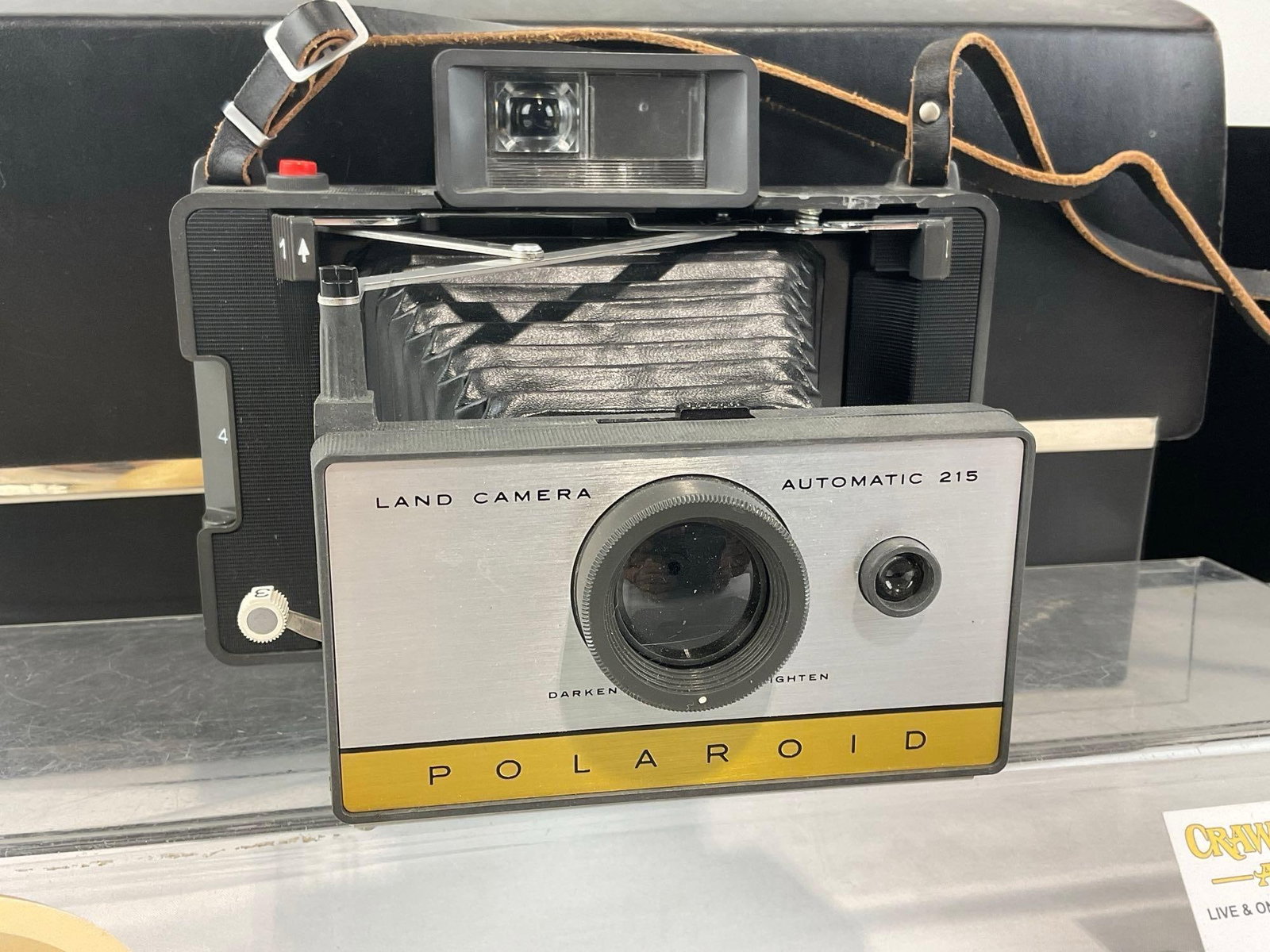 Polaroid Land Camera Automatic 215, w/Leather Case, 2 Flash modules - 2