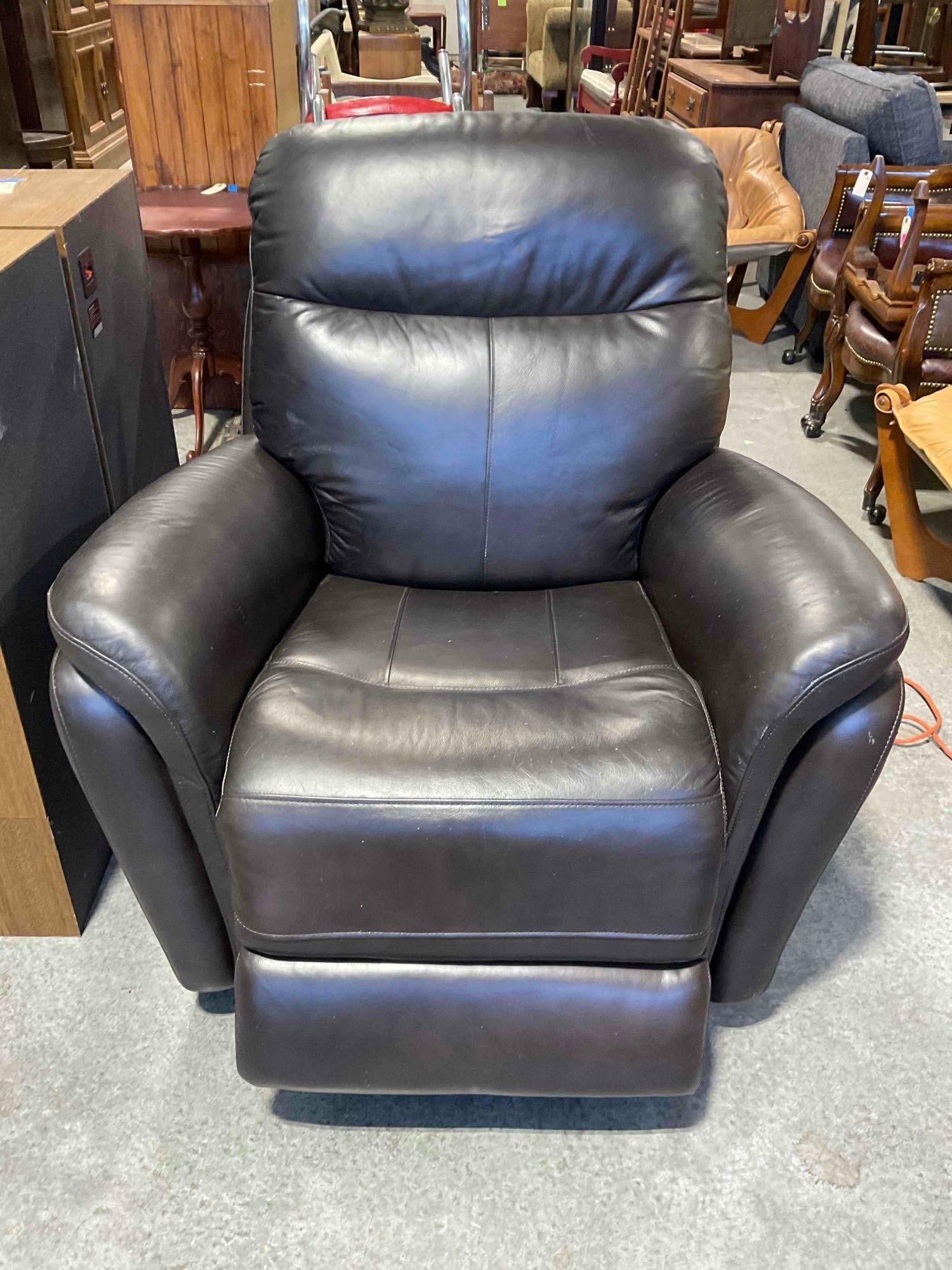 Leggett & Platt Espresso Brown Leather Power Recliner Rocking Chair. Tested, Works. Fair Condition.: leggett & Platt Espresso Brown Leather Power Recliner Rocking Chair. Tested, Works. Fair Condition. Has some scratches and scrapes indicative of age and use, otherwise in fair condition.