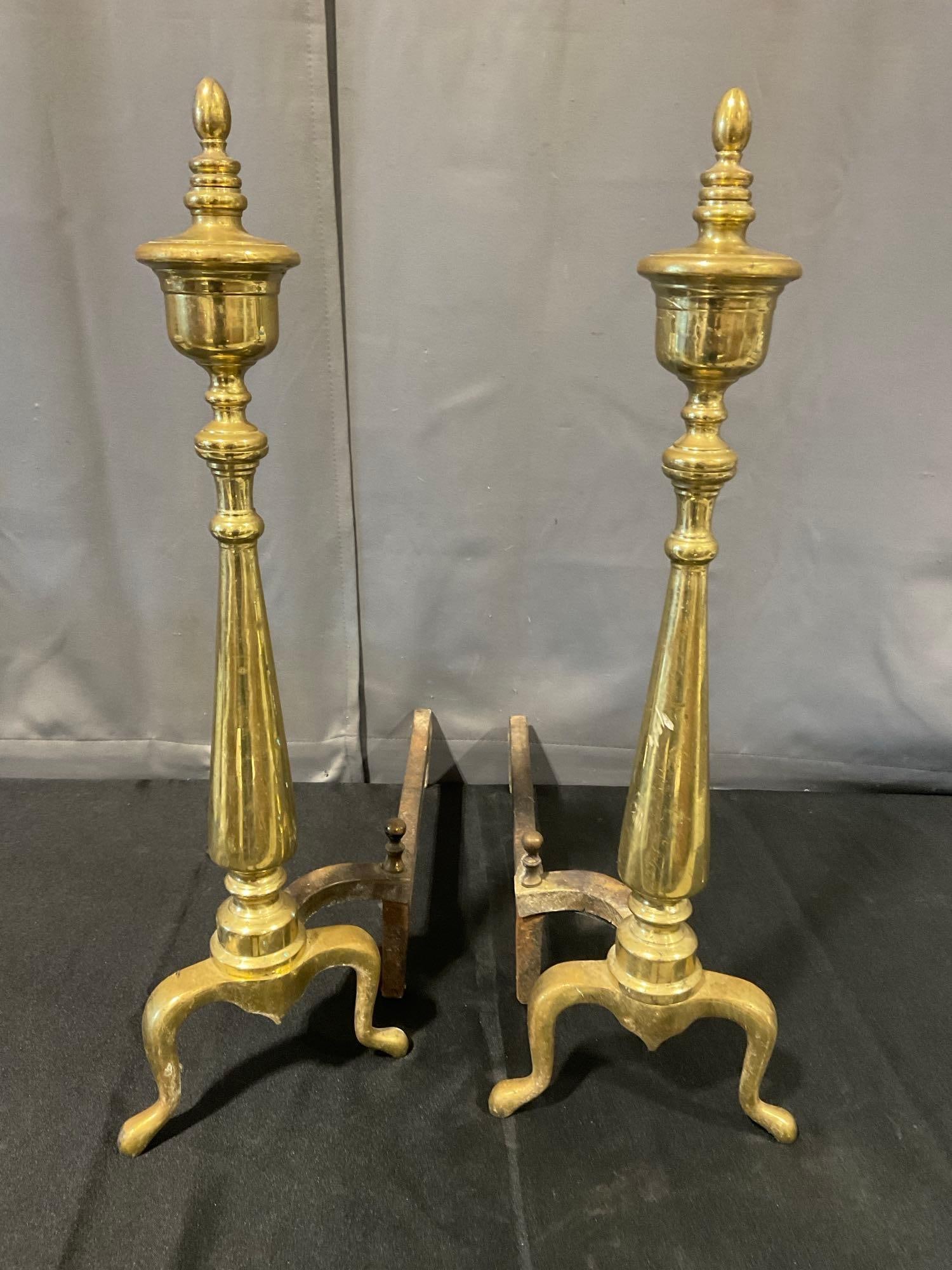 Pair of Antique Cast Brass Sheffield New York Fireplace Andirons, Tall Finial designs: Appears to be in fair to good shape, some lost finish. The piece measures approx 25h x 29w x 9d inches. See pics. E-6610 *Oversized shipping may apply*