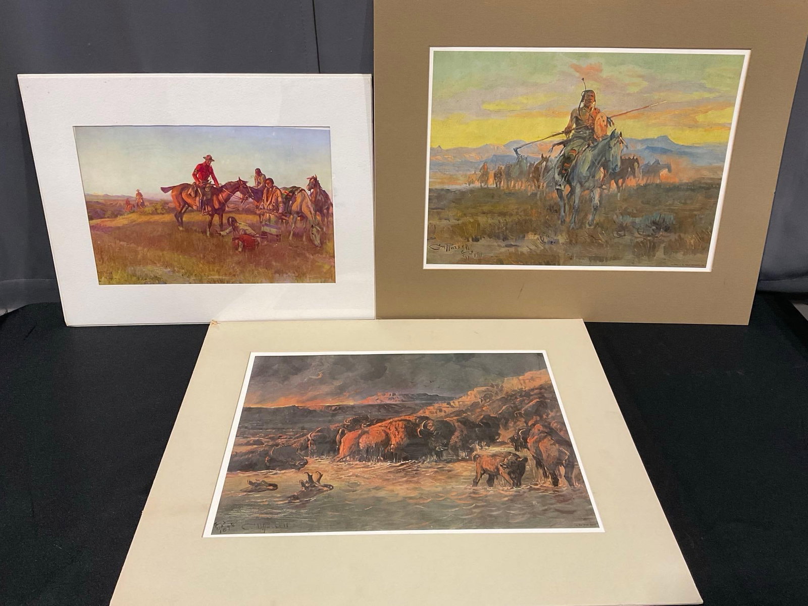 3x CM Russell Western Prints, Cowboy, Native Americans & Cattle on the river scenes, 19x24 inches: Appears to be in good shape. The piece measures approx 19h x 24w x 3d inches. See pics. E-6610