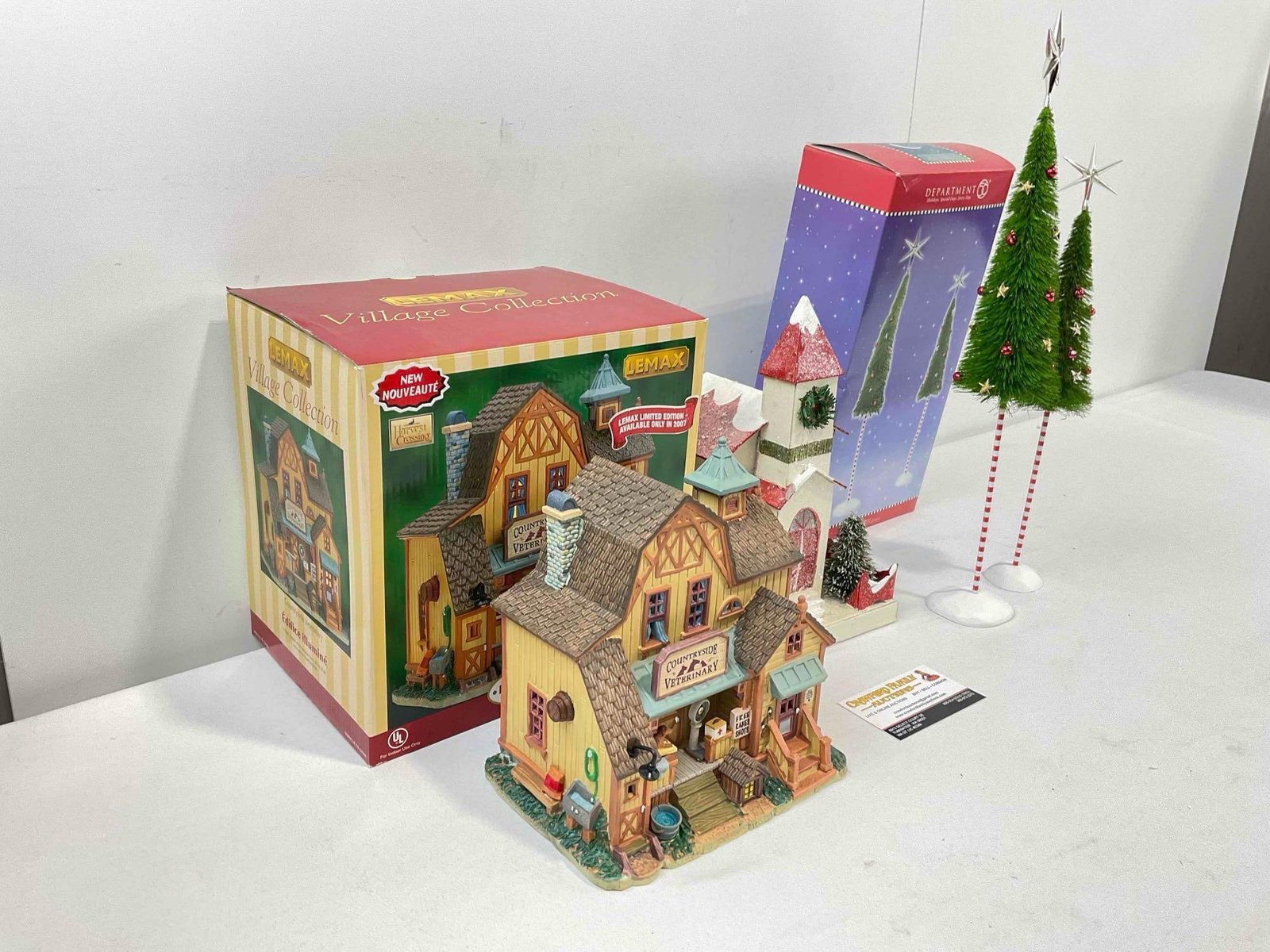 3 pcs Christmas Decorations, incl. LeMax Ceramic Lighted Building & Dept. 56 Sisal Trees. See pics. - 3