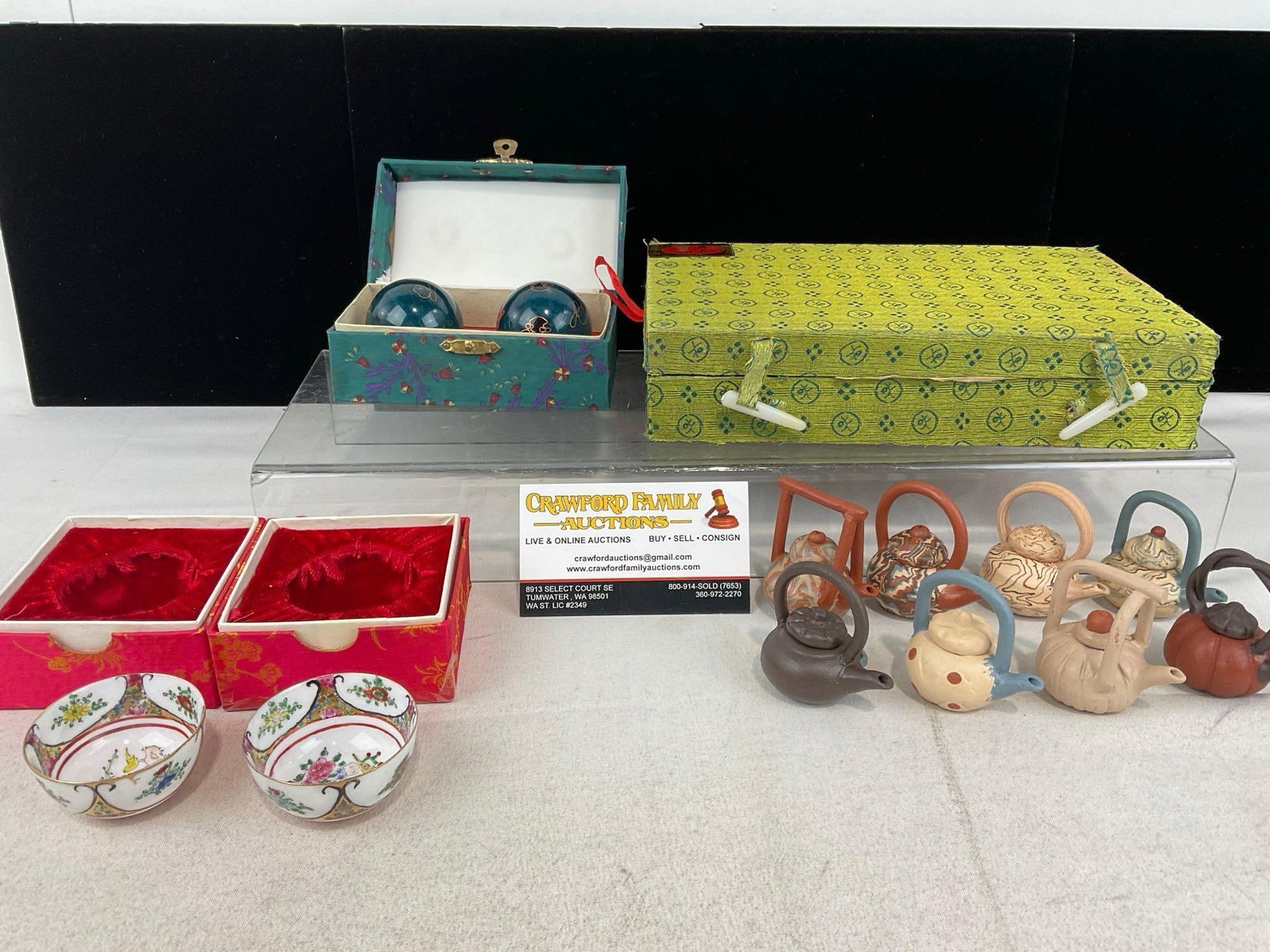 Set of 8 Chinese Mini Teapots, & Pair of cups, Pair of Baoding Balls, in boxes: Appears to be in good shape. The piece measures approx 5h x 9w x 6d inches. See pics. E-6200