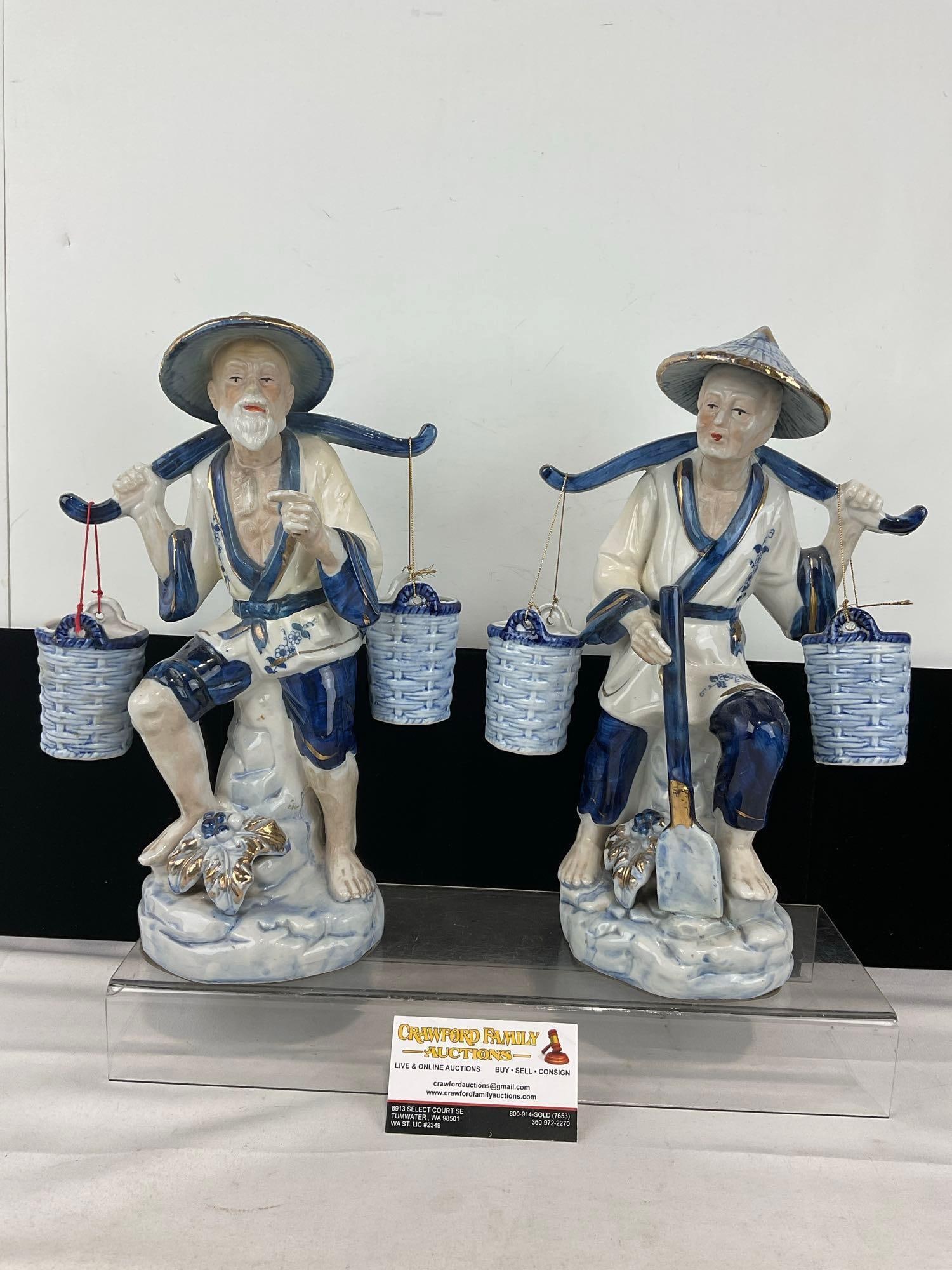 Pair of 1980s Vintage Chinese Porcelain Figurines, Traditional Fishers w/Shoulder Yokes, Blue/White: Appears to be in good shape. The piece measures approx 9h x 13w x 13d inches. See pics. E-6200