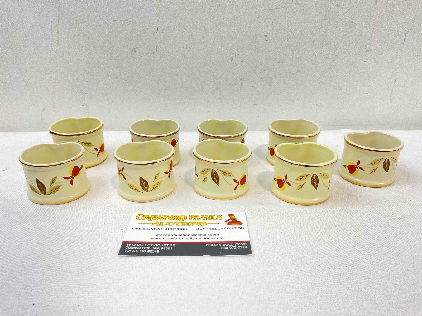 9 pcs China Specialties Ceramic Napkin Rings w/ Hall China's Autumn Leaf Design. See pics.: 9 pcs China Specialties Ceramic Napkin Rings w/ Hall China's Autumn Leaf Design. Look to be modern. Minor wear indicative of age and use, otherwise look to be in good condition. Measures 2" x 2" x 2" 