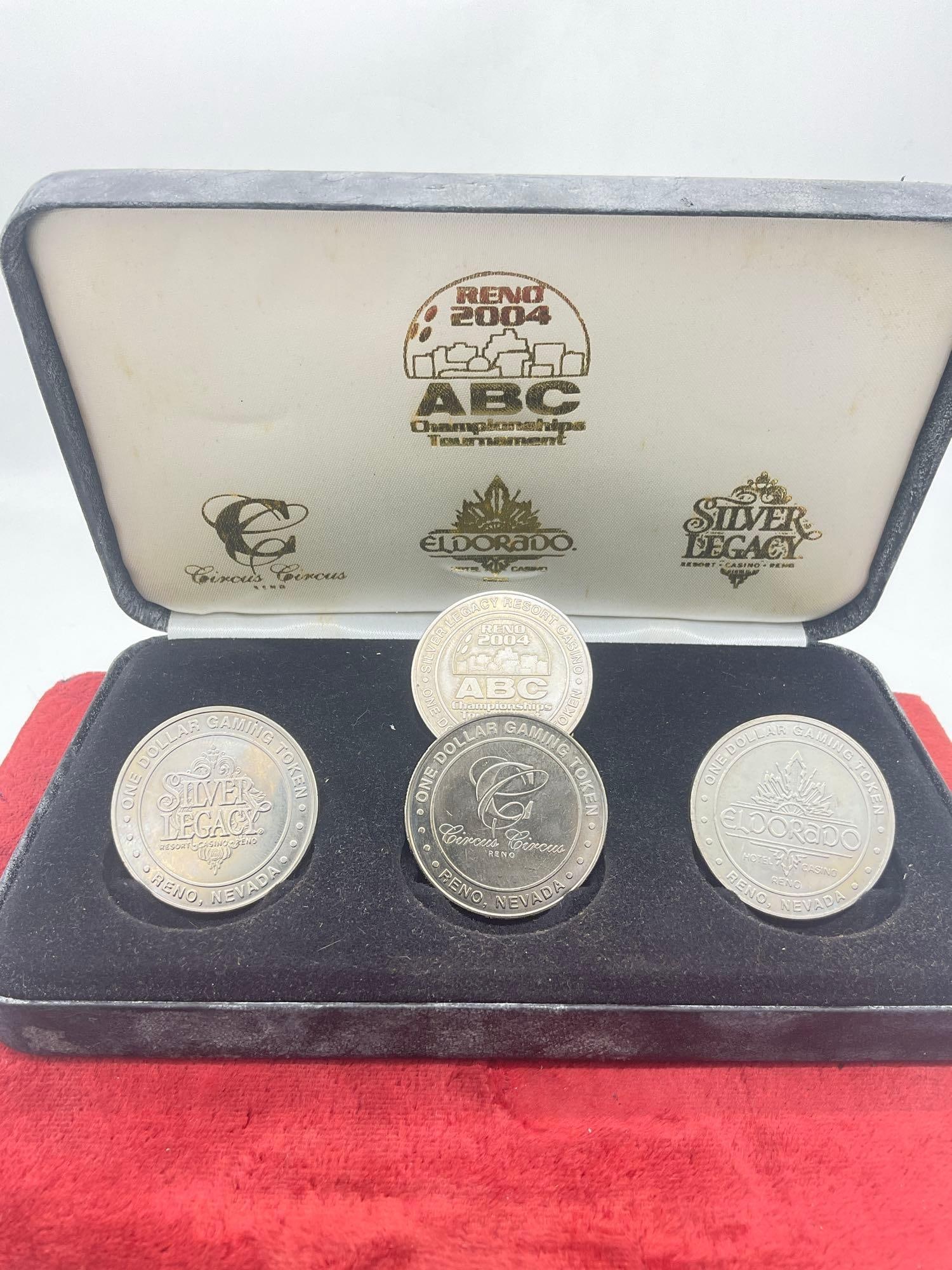 Vintage Reno Nevada 2004 ABC Bowling Championship 4 gaming coin collectors set featuring 3 Casinos: c-5940 Set is in original box and has 4 x clad gaming tokens representing three Reno NV Casinos ,Circus Circus, Silver Legacy & The Eldorado box has been damaged and has
