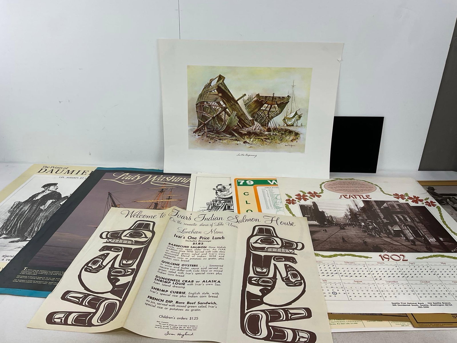 Variety of Artwork, Posters, Daumier, Lady Washington, & Calendars, Ivars 1970s Menu, 28x20 in: Appears to be in good shape. The piece measures approx 20h x 3w x 3d inches. See pics. E-5360