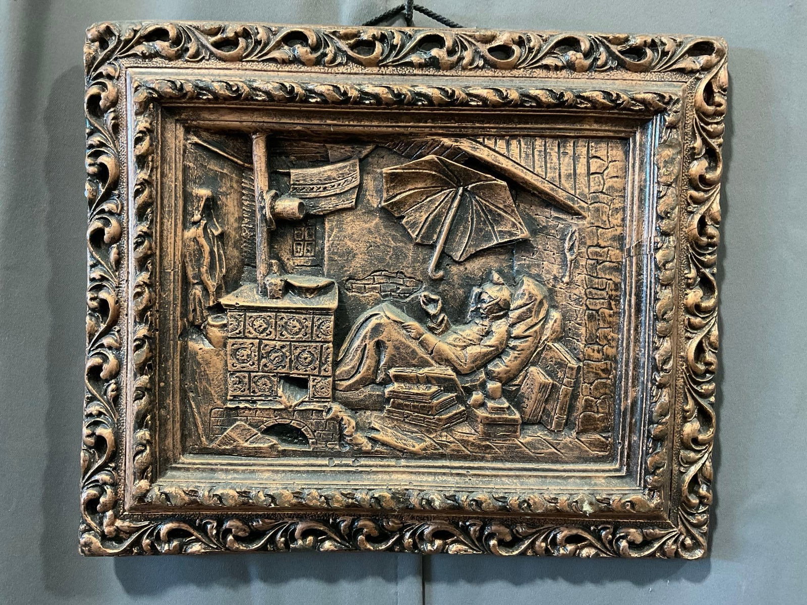 Vintage Wood Resin Relief Artwork, titled Der Arme Poet, 13x14 inches, Spitzweg style repro: The frame is integral to the piece, same material. Appears to be in good shape, previously repaired. The piece measures approx 13h x 14w x 3d inches. See pics. E-6080