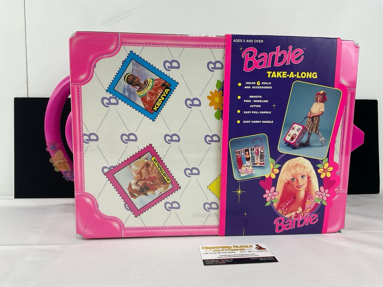 Mattel 1997 Barbie Toy Suitcase, Pink Pleather w/ 8 niches for dolls, 11x20x8 inches: Appears to be in good shape, still has the packaging cardboard on the outside, some storage wear. The piece measures approx 11h x 20w x 8d inches. See pics. E-6630