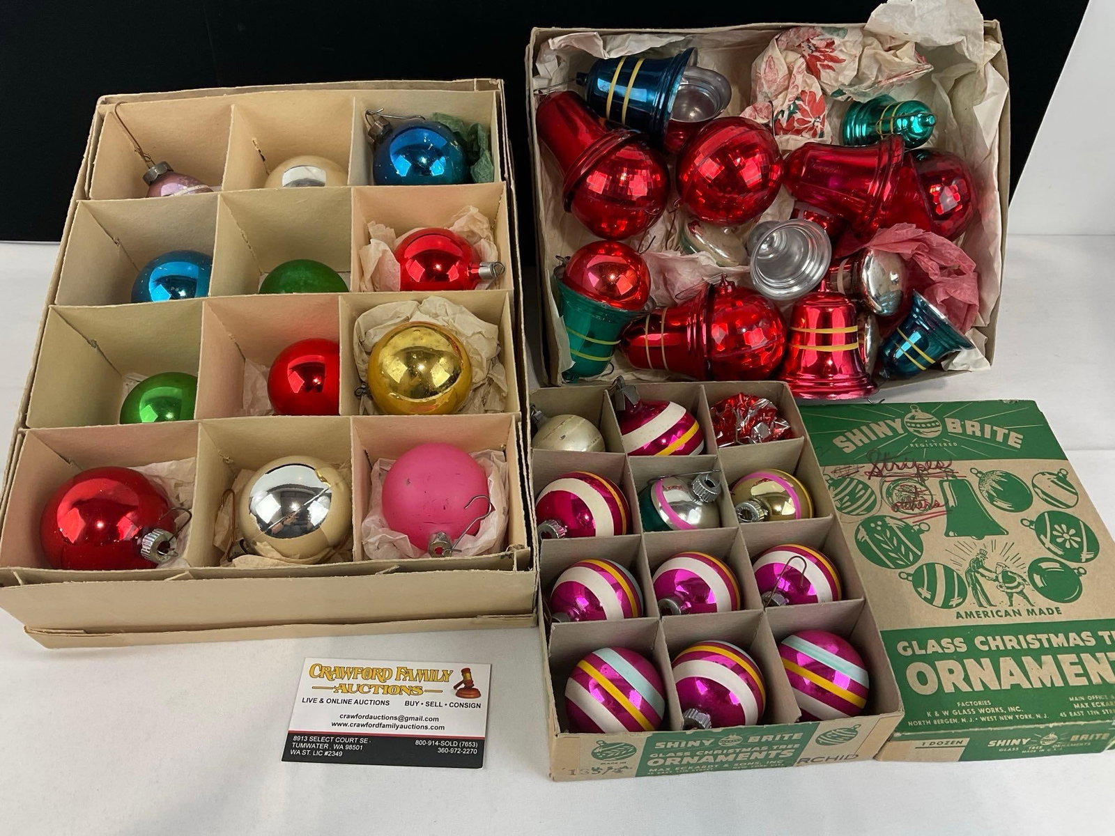 Variety Glass Christmas Ornaments w/boxes, Shiny Brite globes, Bells, & more: Appears to be in fair to good shape shows some wear on a few of the pieces. The piece measures approx 9h x 13w x 10d inches. See pics. E-6610