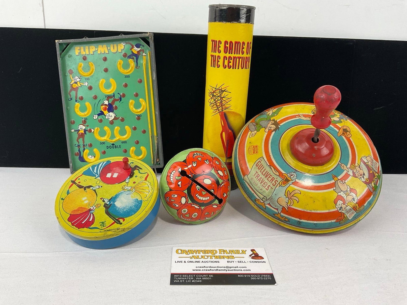 Vintage Toys, Tin Noisemaker, Bell, 1939 Gullivers Travels Spinning Top Toy, Flip M Up Mini Pinball: Shows some finish wear on some of the tin toys from use, or storage. See pics for condition. Measures approx 7h x 9w x 12d inches. E-6610