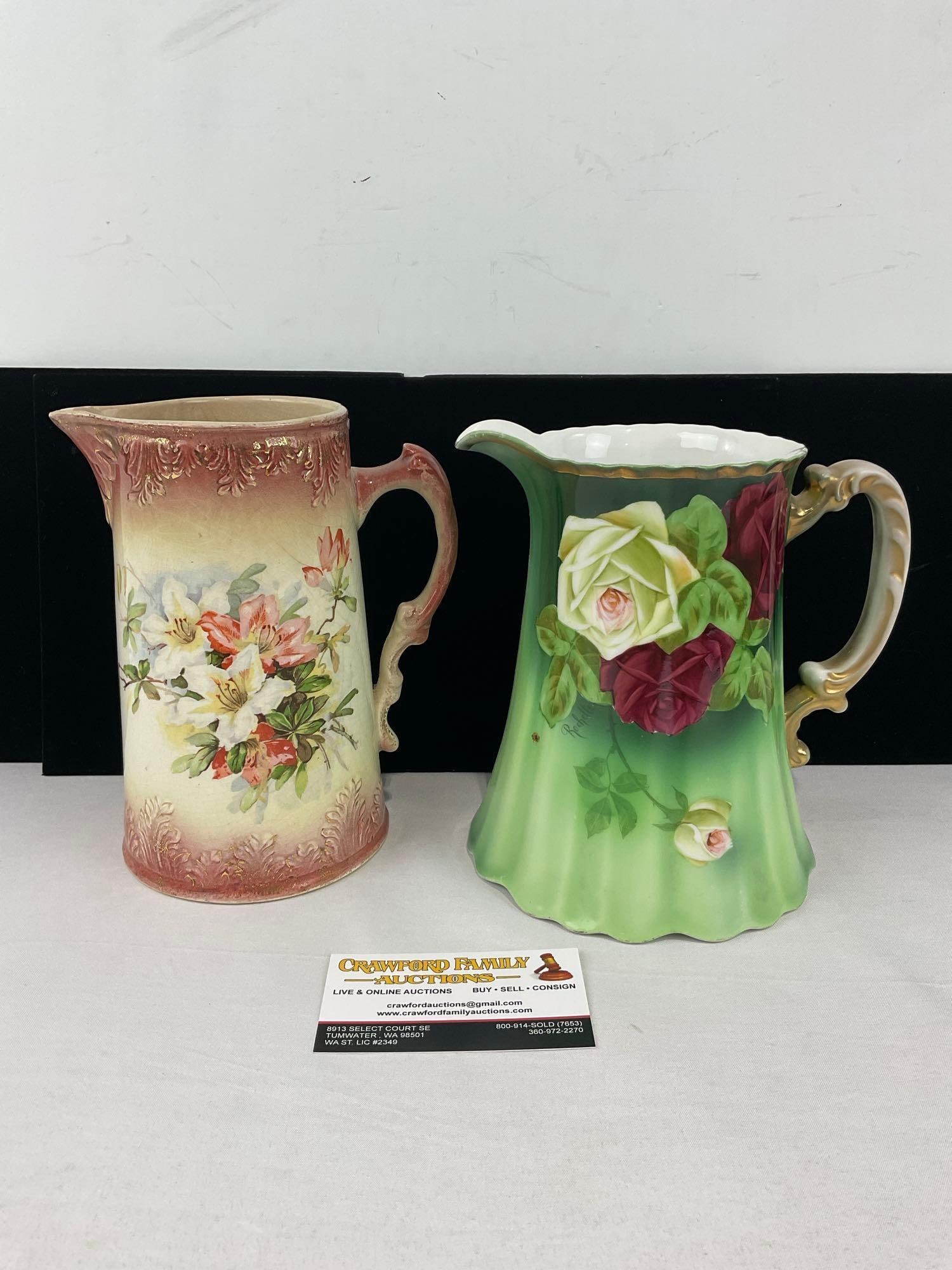 Pair of Vintage Pitchers, C Bros Staffordshire & Royal Munich, Handpainted Floral designs: One chip on the rim of the green piece. See pics for condition. Measures approx 9h x 12w x 9d inches. E-6610