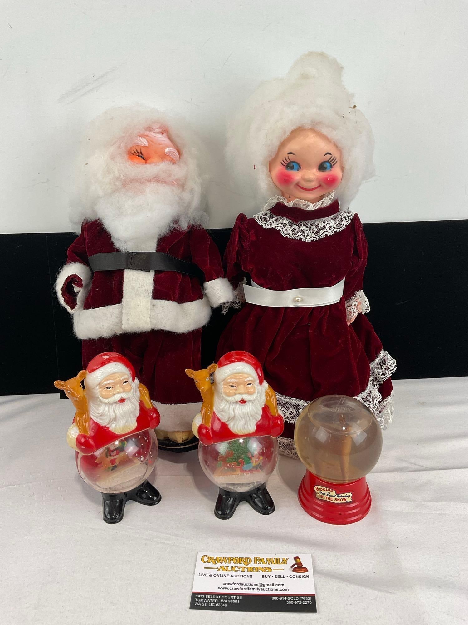 Handmade Santa & Mrs. Claus Figures, Red Velvet, 2x Santa Snowglobes & Rudolph Snowglobe Driss Co.: See pics for condition. All together measures approx 5h x 17w x 14d inches. E-6610