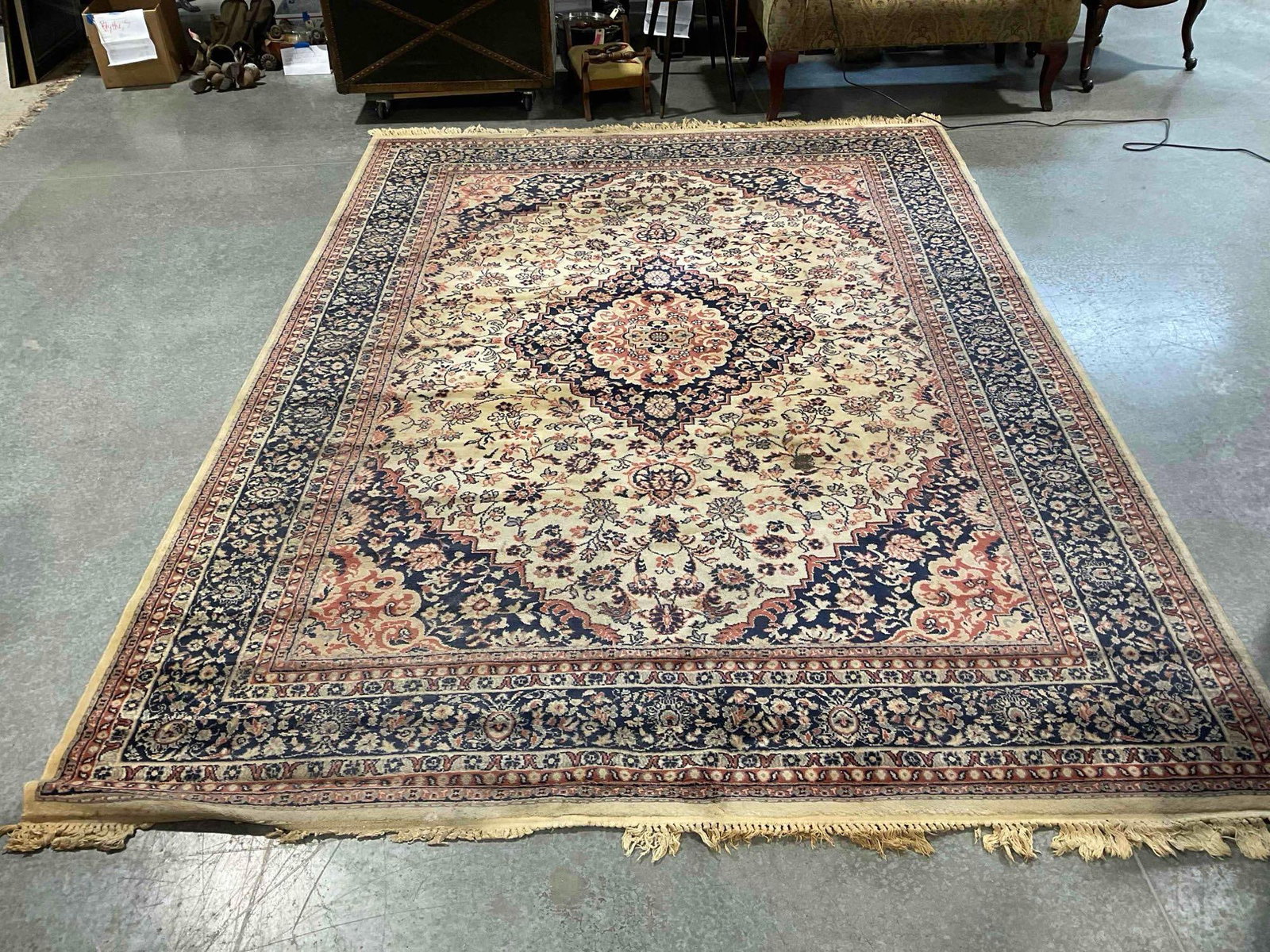Vintage Bigelow Cream & Navy Blue Wool Pile Persian Rug in Tabriz Pattern. 94" x 130": Vintage Bigelow Cream & Navy Blue Wool Pile Persian Rug in Tabriz Pattern. Measures 94" x 130" See pics for condition. Rug is stained and worn, tassels on one end are very tired, needs a good clea