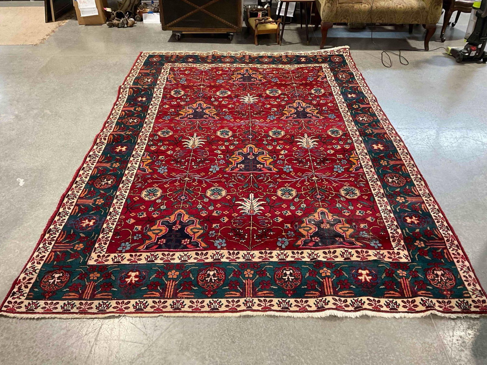 Vintage Made in Iran Green & Red Tabriz Style Wool Pile Persian Rug. Measures 133" x 93": Vintage Made in Iran Green & Red Tabriz Style Wool Pile Persian Rug. Measures 133" x 93" Piece has wear indicative of age and use, tassels are quite worn, has some ink bleeding, look to pictures
