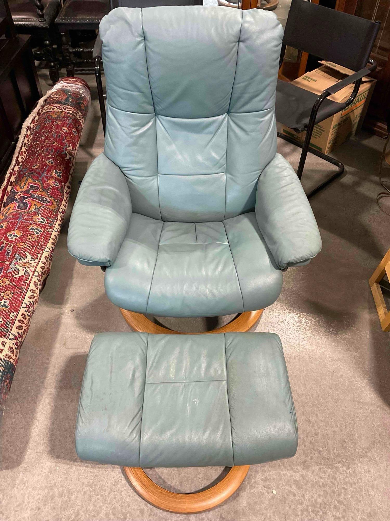 EKORNeS Stressless Recliner Chair & Ottoman in Lovely Pale Turquoise Leather Upholstery.: EKORNeS Stressless Recliner Chair & Ottoman in Lovely Pale Turquoise Leather Upholstery. Stained and scuffed, the pieces have wear indicative of age and use, see photos for condition. Color is